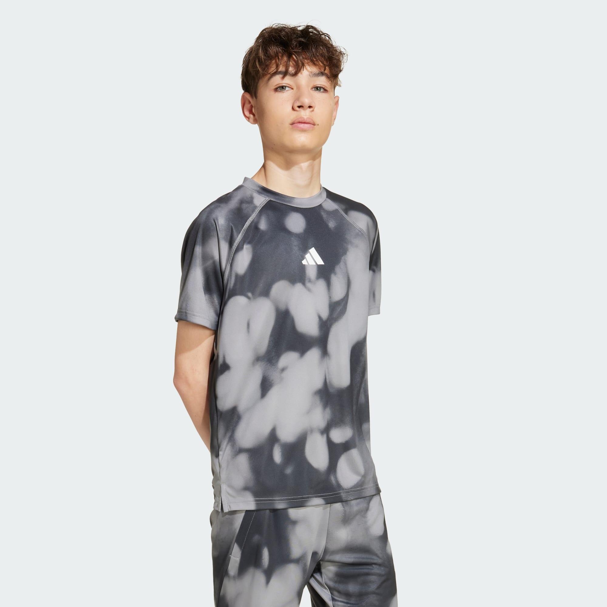 Koszulka treningowa z grafiką na całej powierzchni