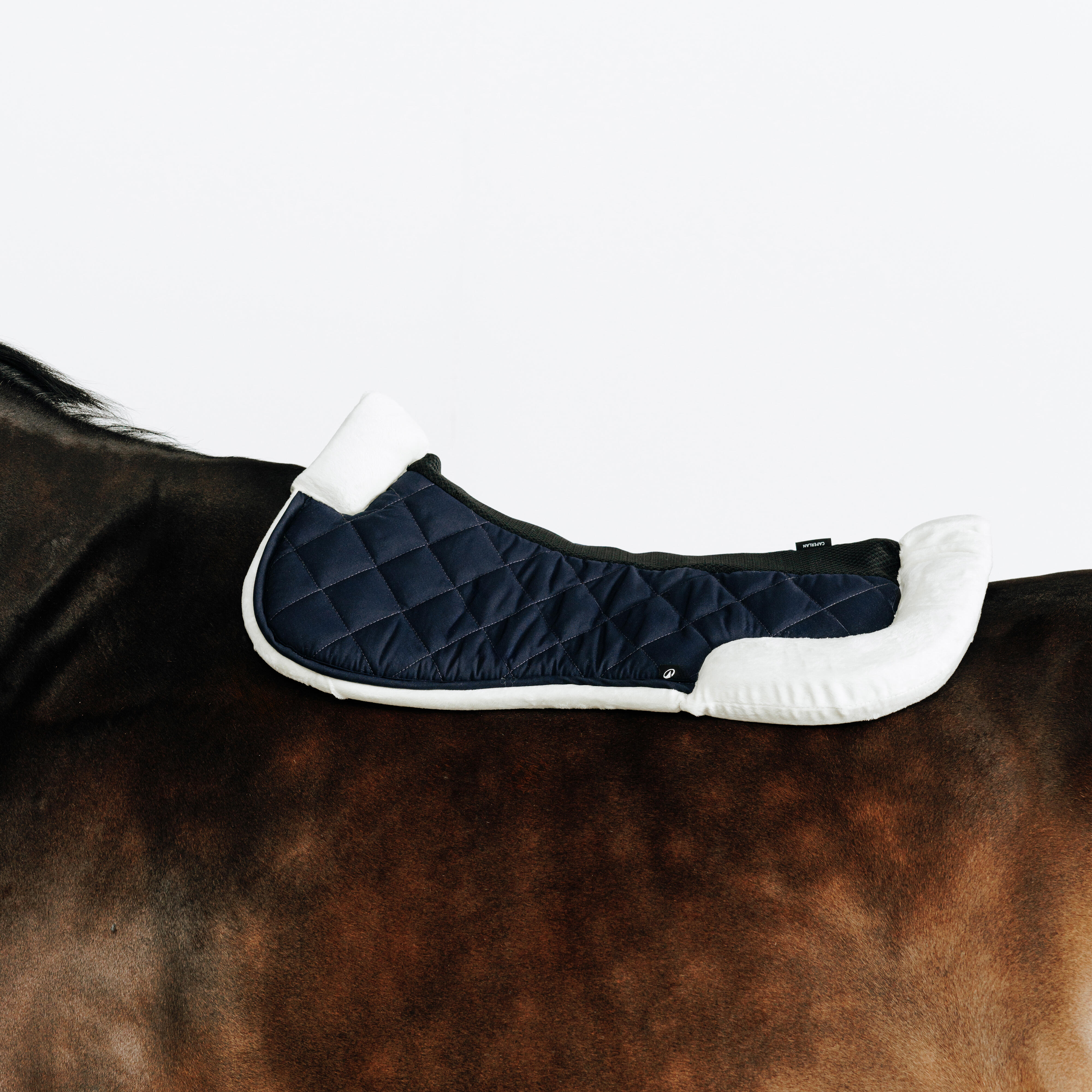 Podkładka pod siodło Fouganza 500 z futerkiem dla konia i kuca
