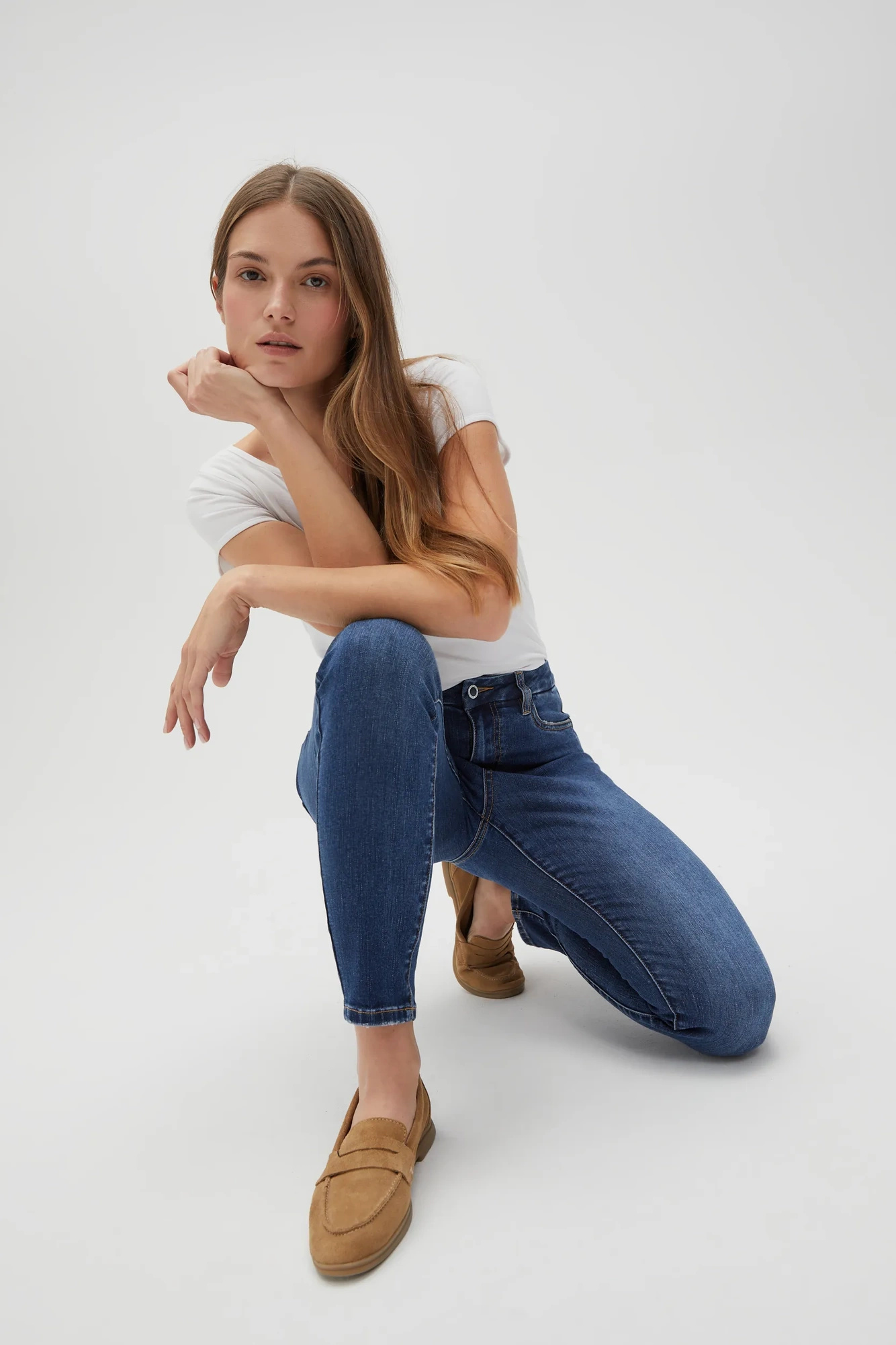 Jeansy skinny ze średnim stanem niebieskie