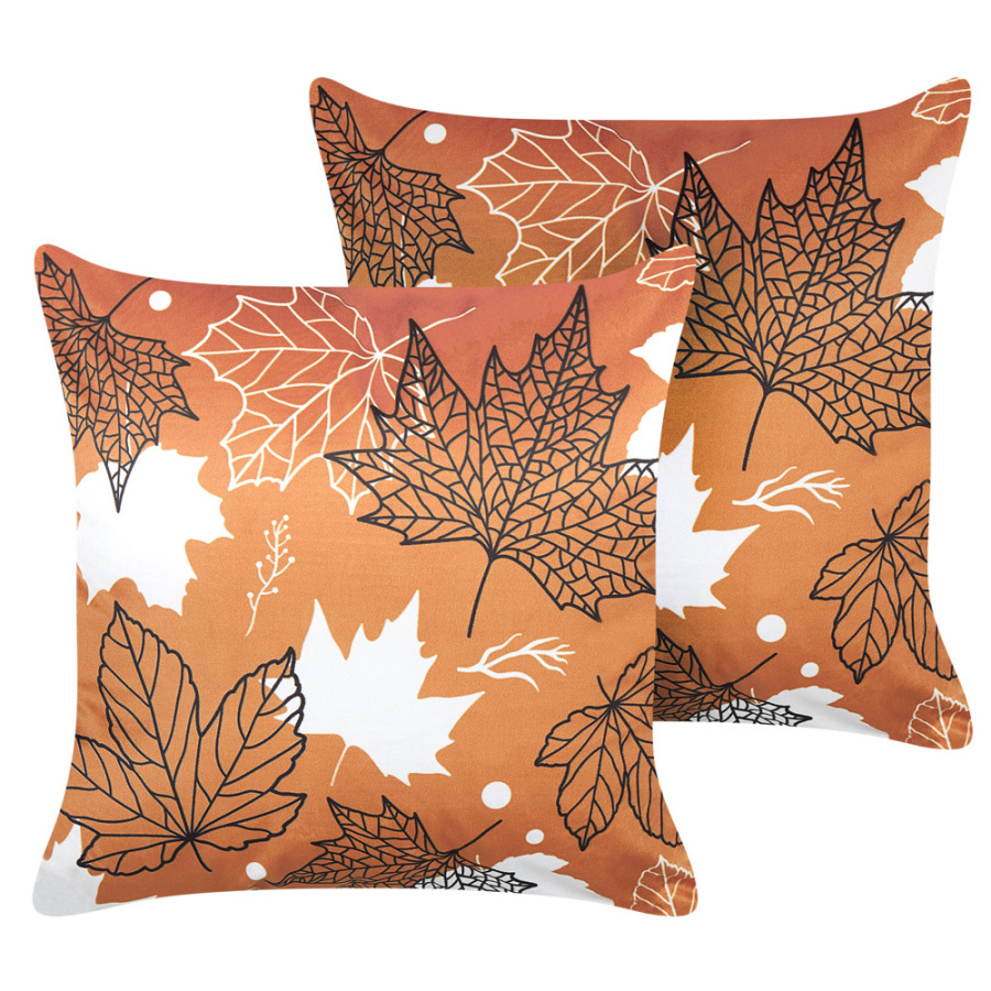 Zestaw 2 poduszek wzór roślinny poinsettia welur 45 x 45 cm pomarańczowy
