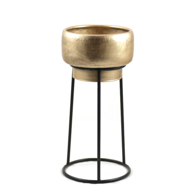 Kwietnik metalowy w kolorze złotym na metalowych nogach