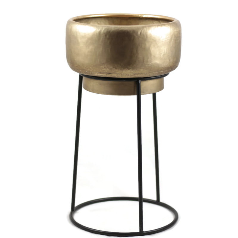 Kwietnik metalowy w kolorze złotym na metalowych nogach
