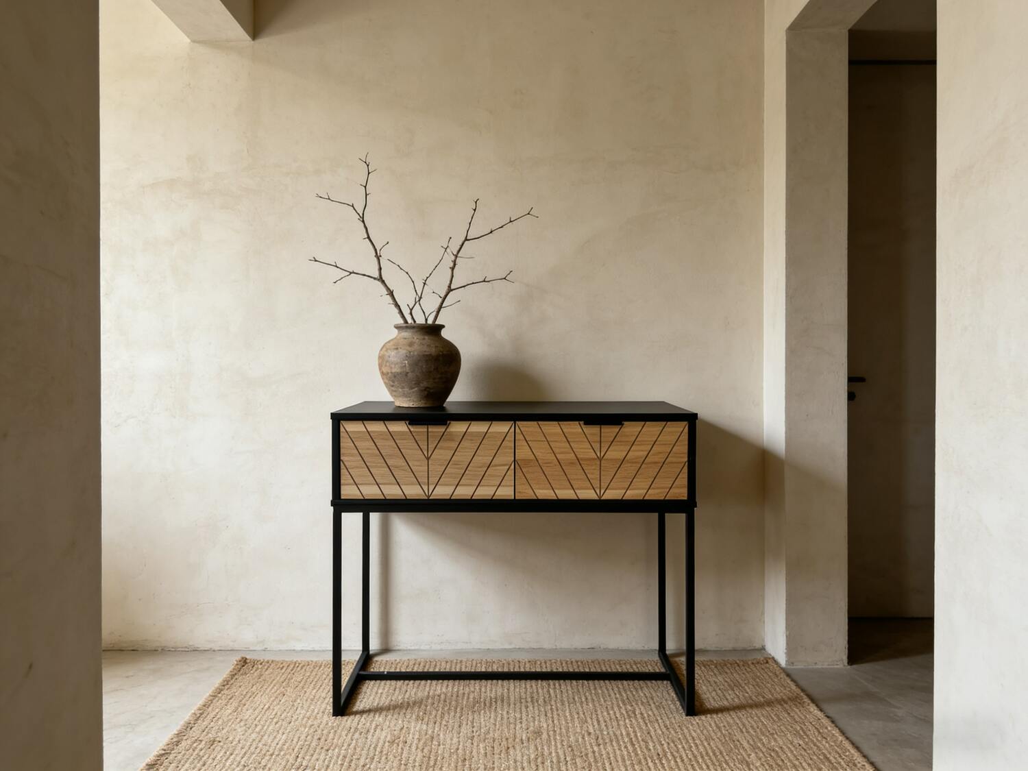 Czarna konsola z frontem jodełka dąb