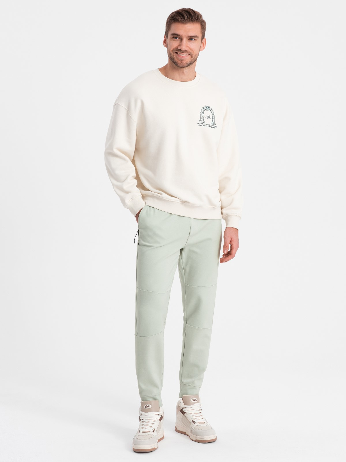 Męskie spodnie joggery dresowe na gumce z przeszyciami – miętowe V3