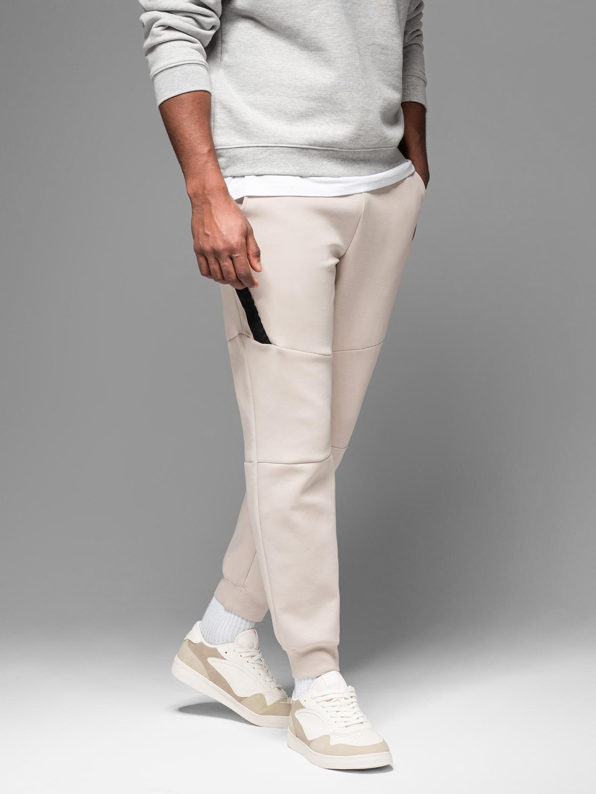 Męskie spodnie dresowe ze ściągaczami i ozdobnym zamkiem – piaskowe V6 - Rozmiar: S