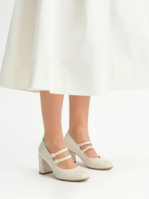 Kremowe czółenka damskie z dekoracyjnymi paskami