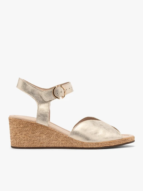 Platynowe sandały na spodzie typu koturna