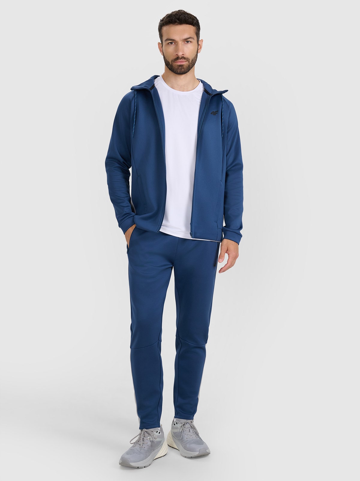 4F Spodnie treningowe szybkoschnące męskie - niebieskie L