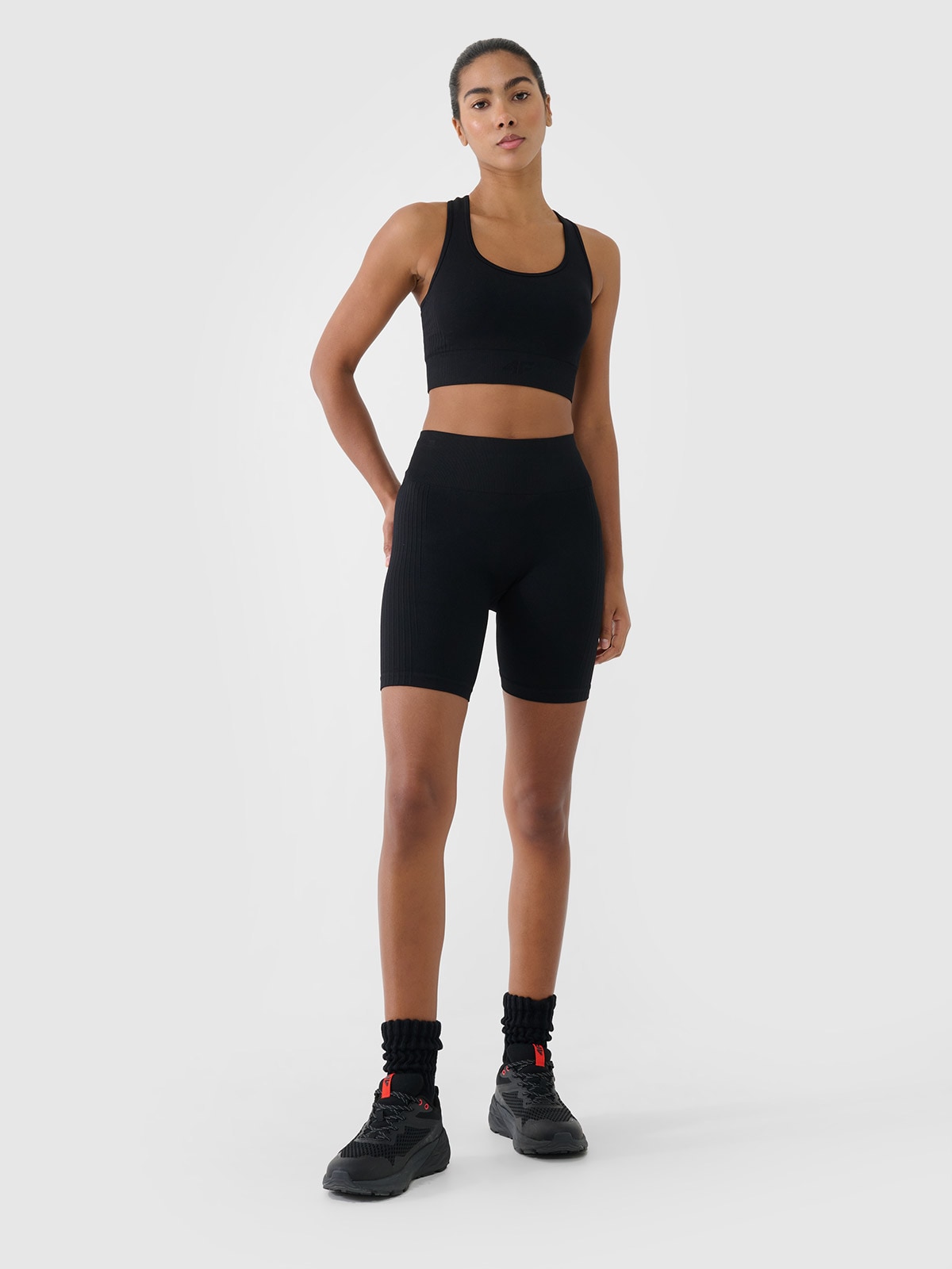 4F Legginsy kolarki treningowe bezszwowe damskie - czarne XS/S