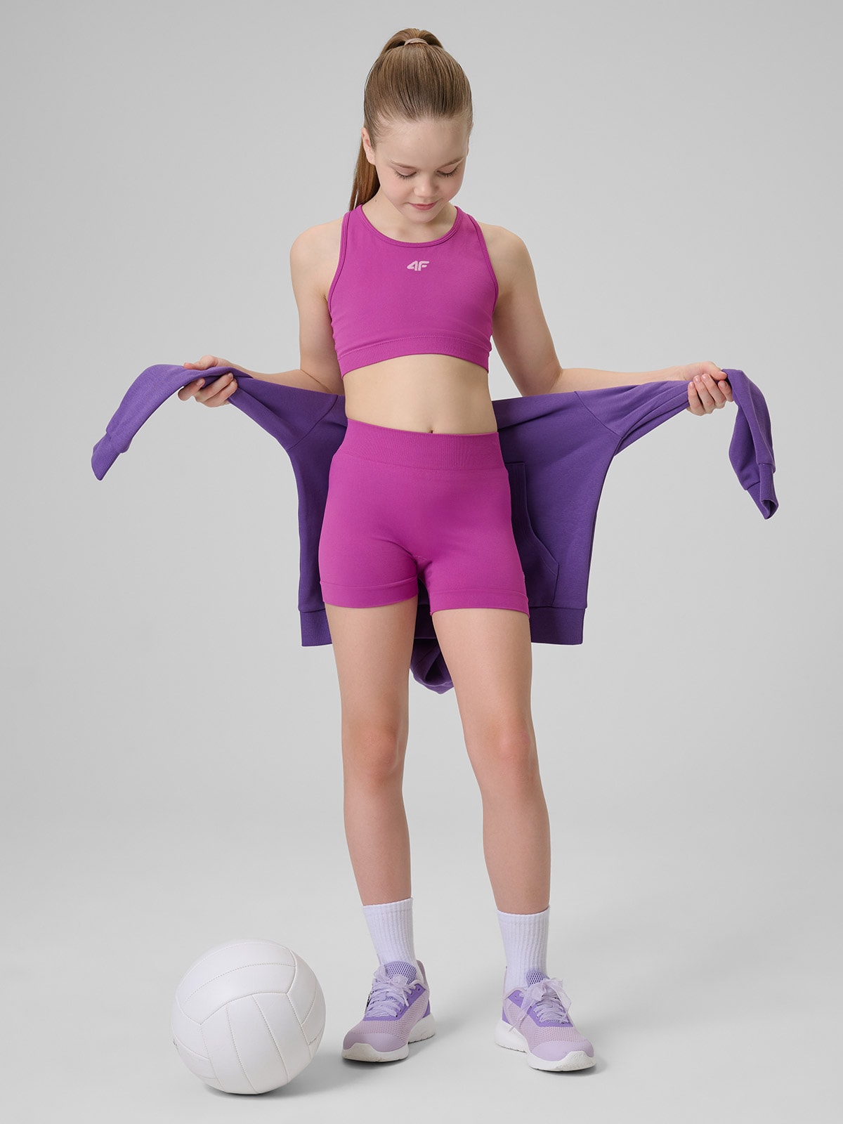 4F Legginsy krótkie sportowe bezszwowe dziewczęce - różowe 140/146 (9-11 lat)