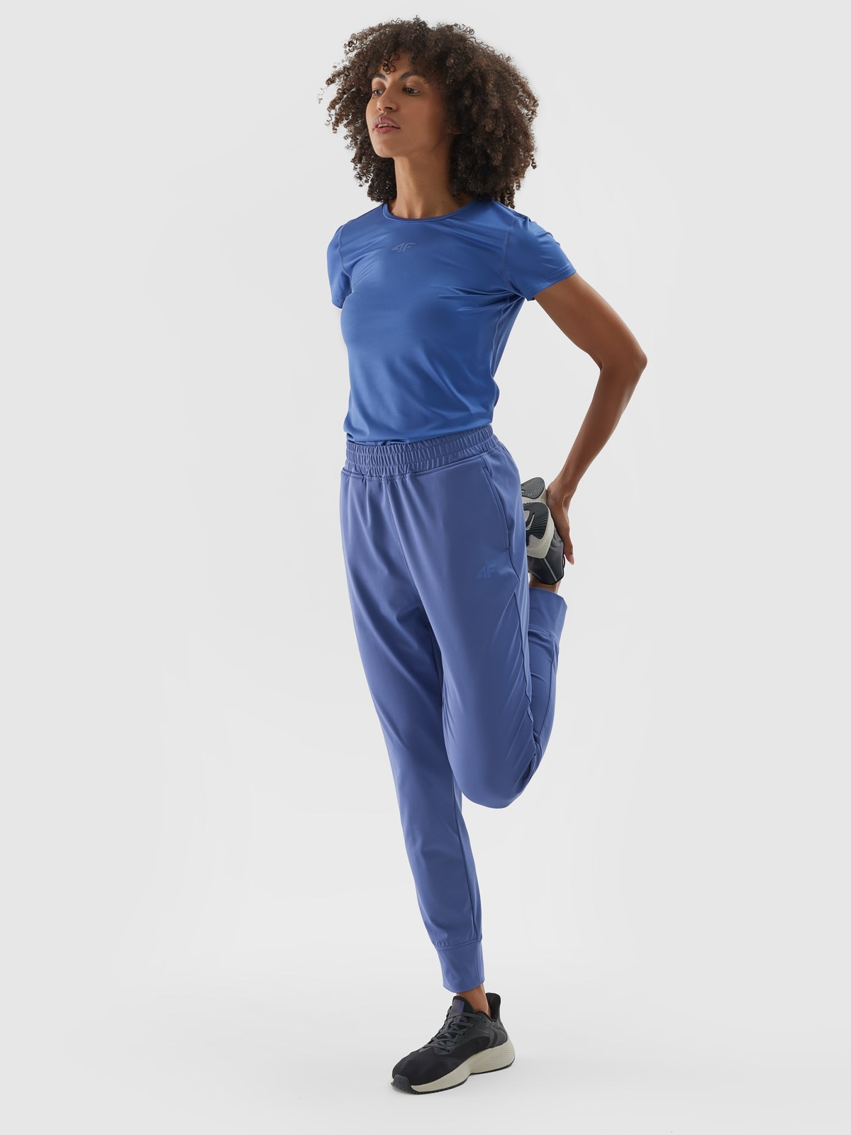 4F Spodnie treningowe szybkoschnące damskie - granatowe L