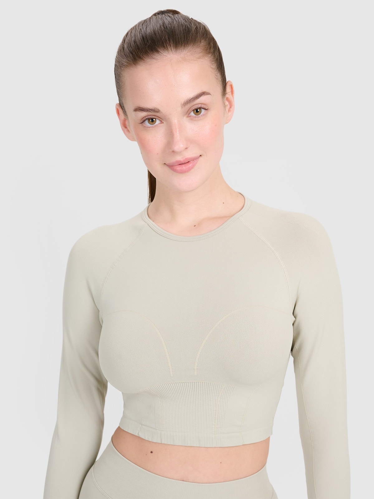 4F Longsleeve treningowy crop-top z wycięciem na plecach damski - beżowy M/L