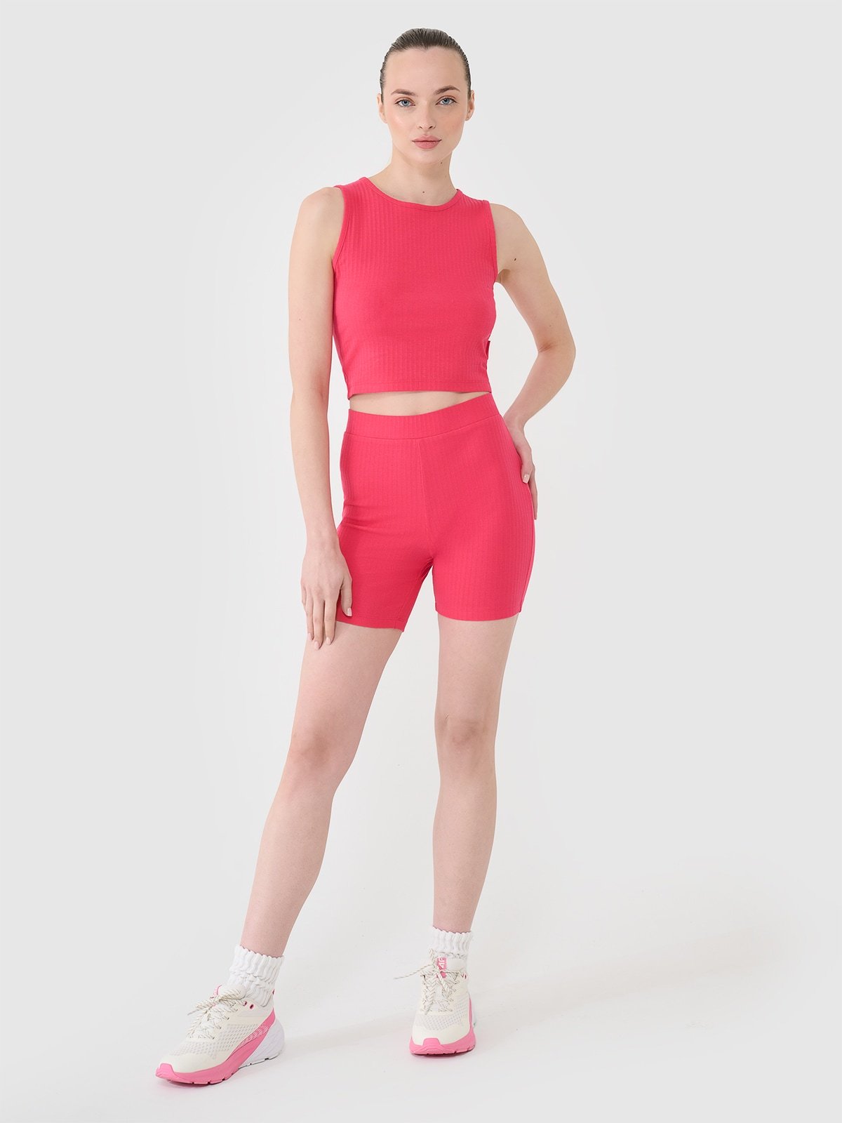 4F Legginsy krótkie dzianinowe damskie - różowe S