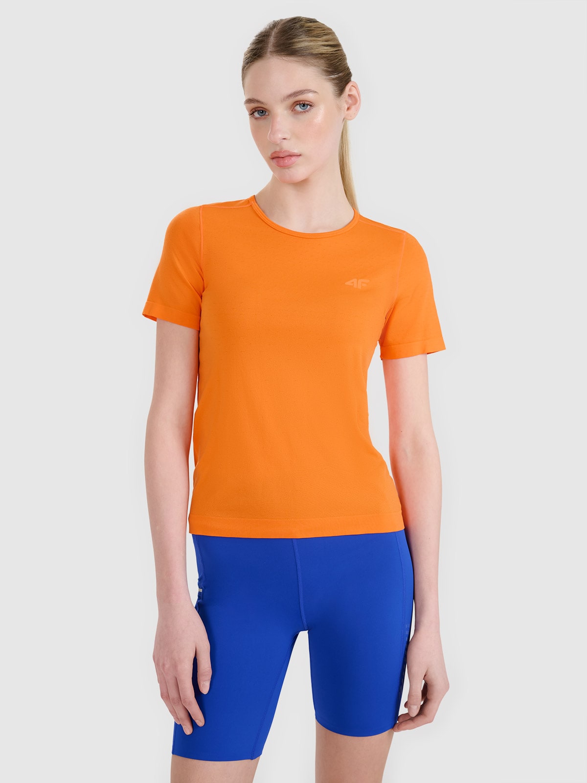 4F Koszulka do biegania w terenie regular damska - pomarańczowa XS/S