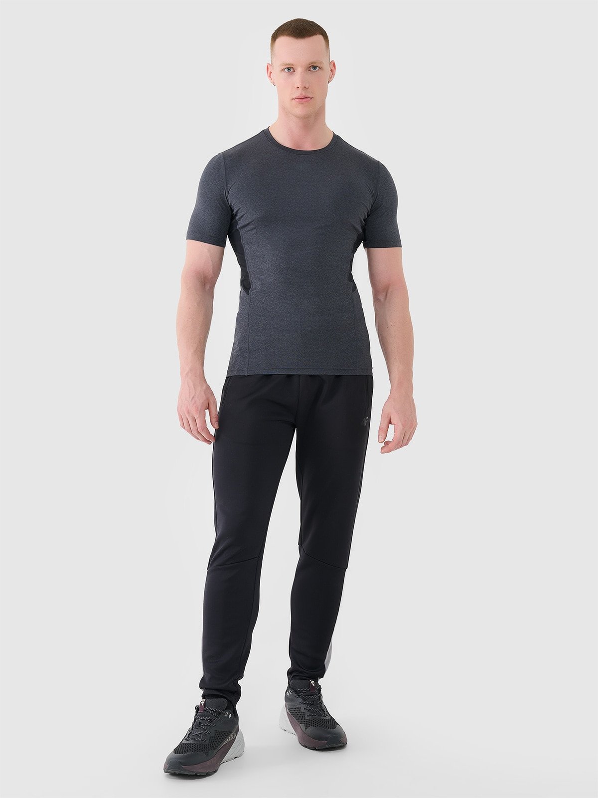 4F Spodnie treningowe szybkoschnące męskie - czarne XL