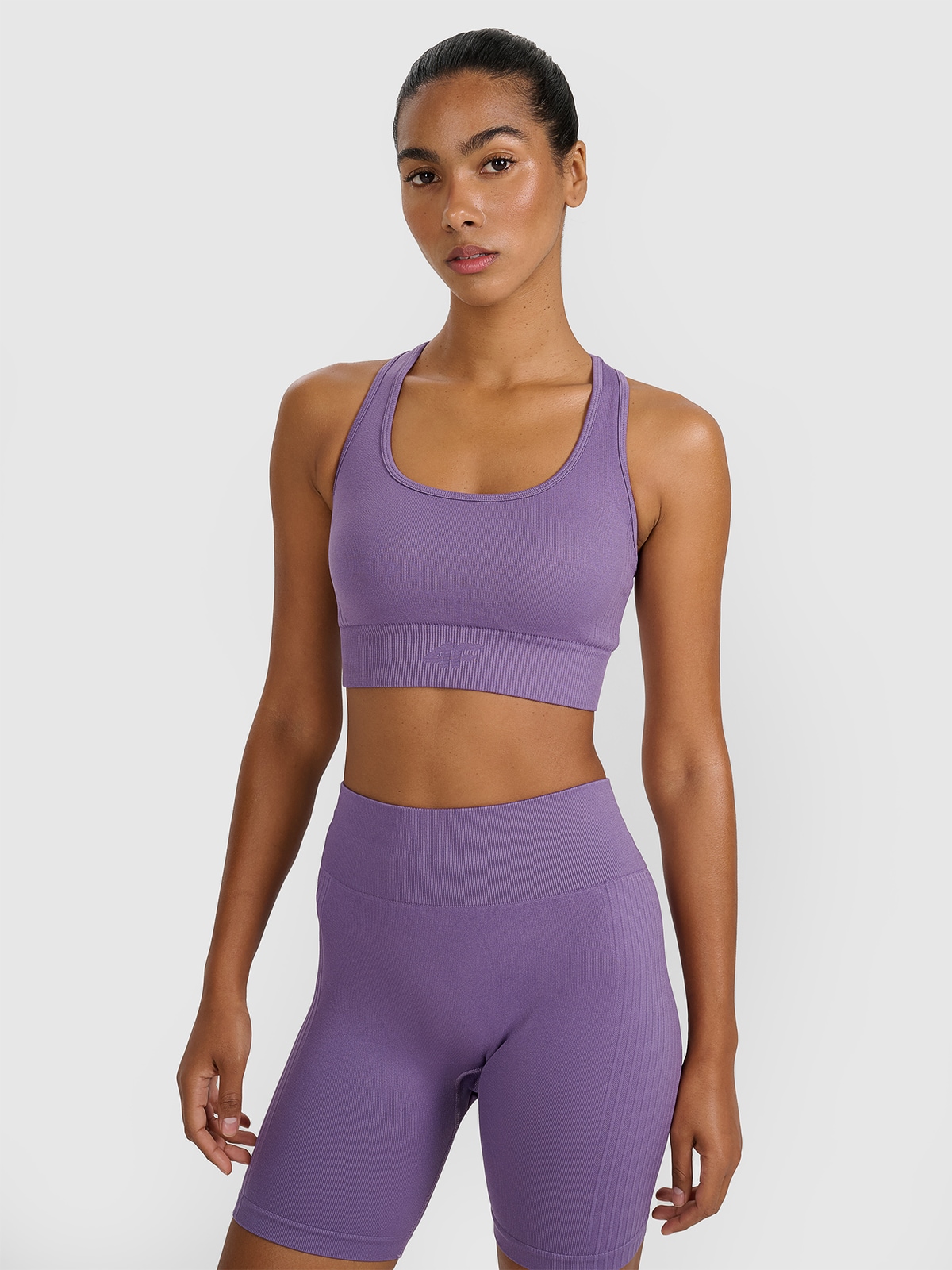 4F Biustonosz treningowy z niskim wsparciem damski - fioletowy XS/S