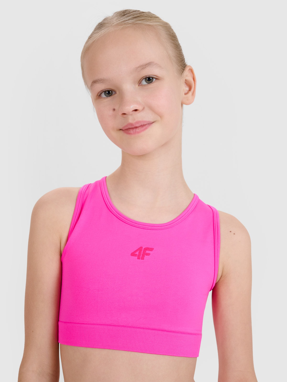 4F Stanik sportowy szybkoschnący dziewczęcy - różowy 164 (13-14 lat)