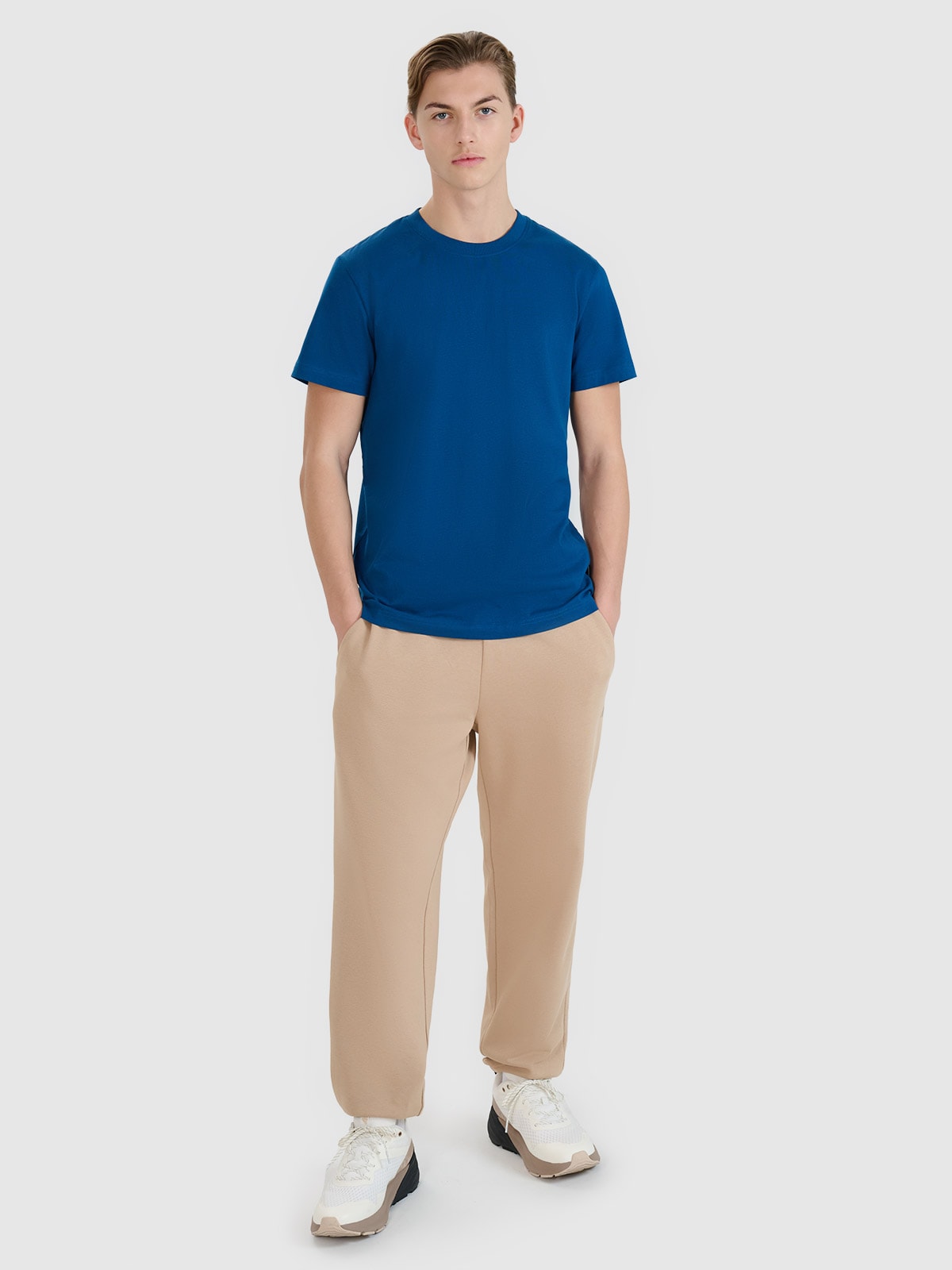 4F Spodnie dresowe joggery męskie - beżowe XXL