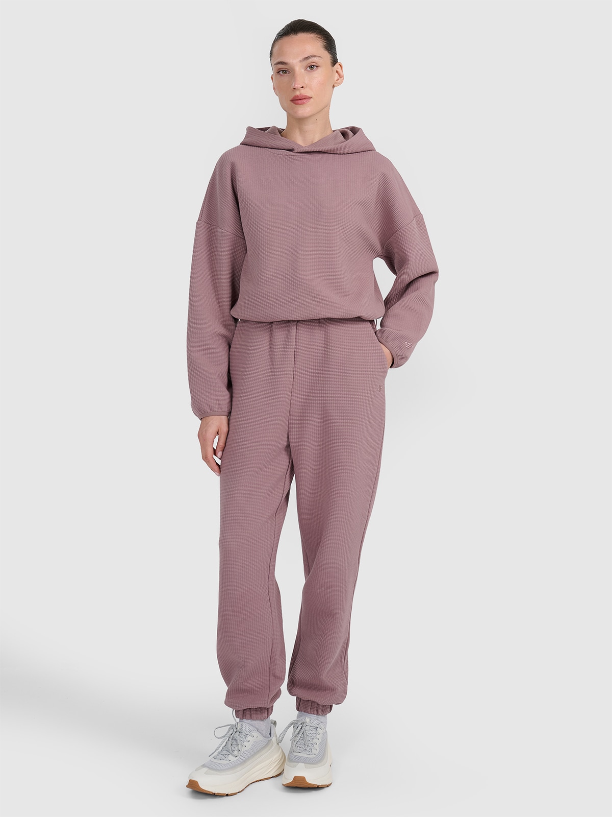 4F Spodnie dresowe z waflowej dzianiny damskie - brązowe XL