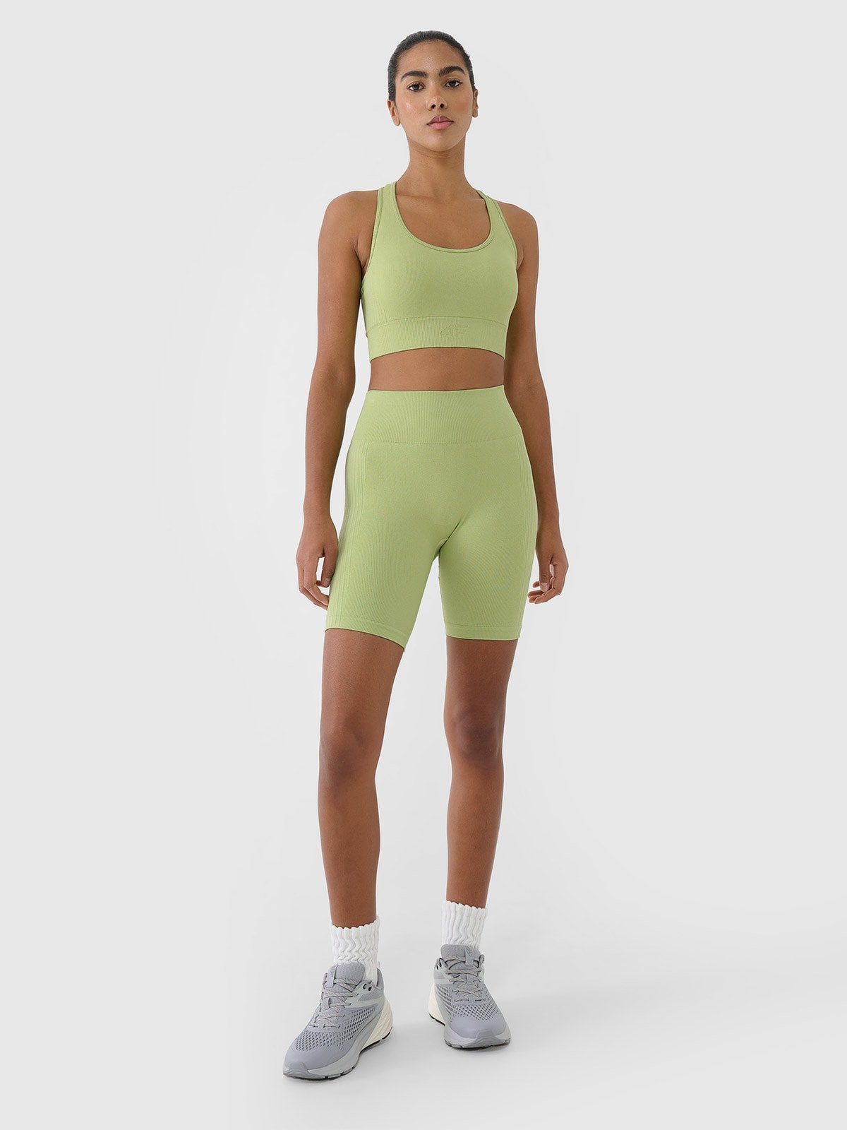 4F Legginsy kolarki bezszwowe treningowe damskie - zielone M/L