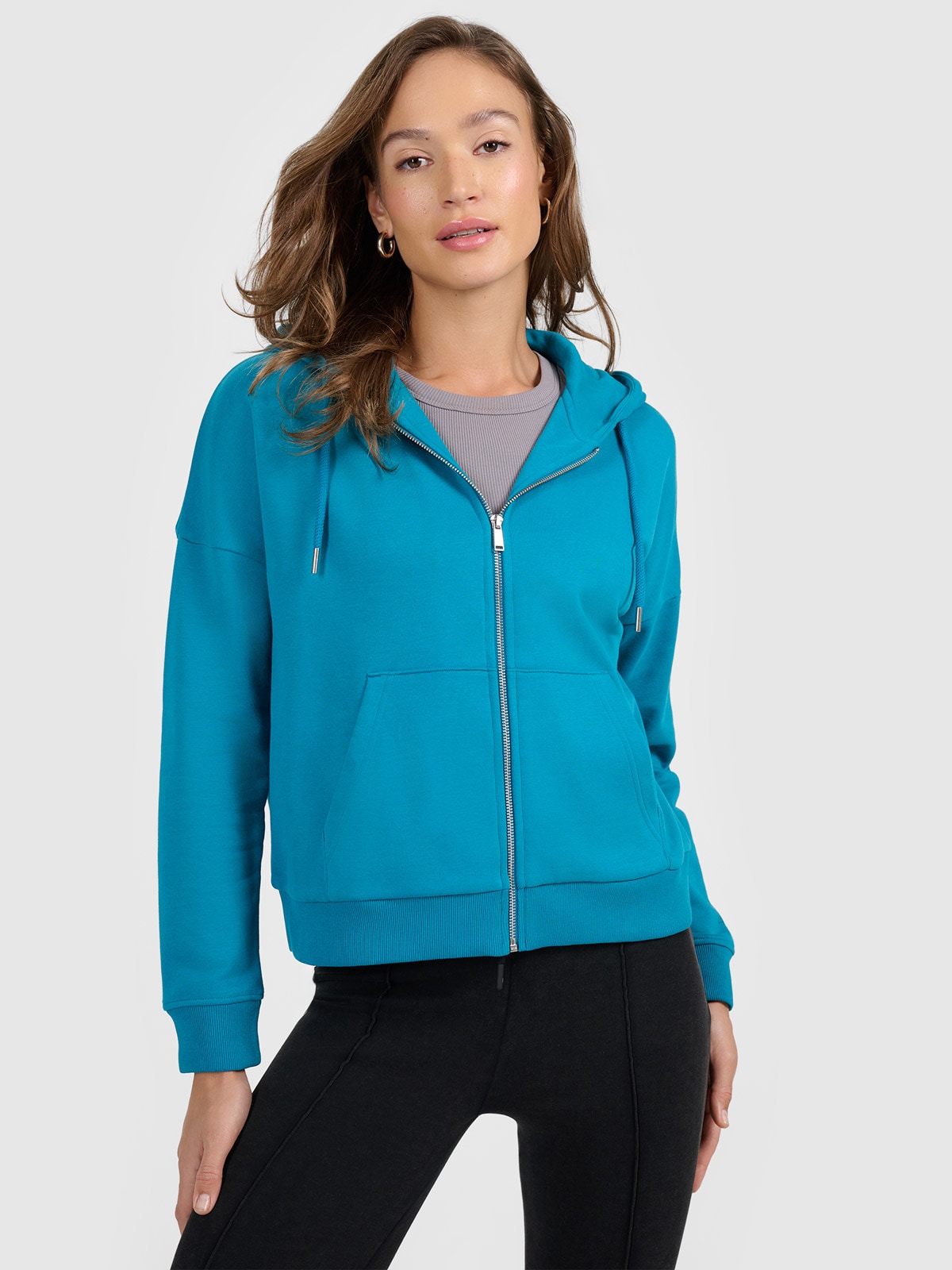 4F Bluza dresowa rozpinana z kapturem damska - turkusowa XL