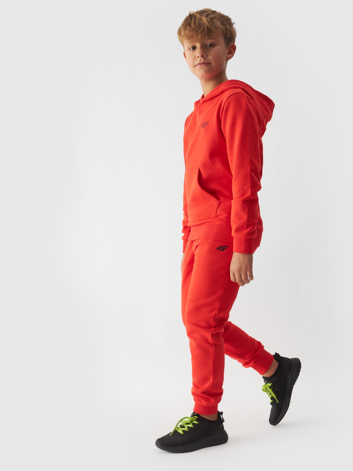 4F Spodnie dresowe joggery chłopięce - pomarańczowe 128 (7-8 lat)