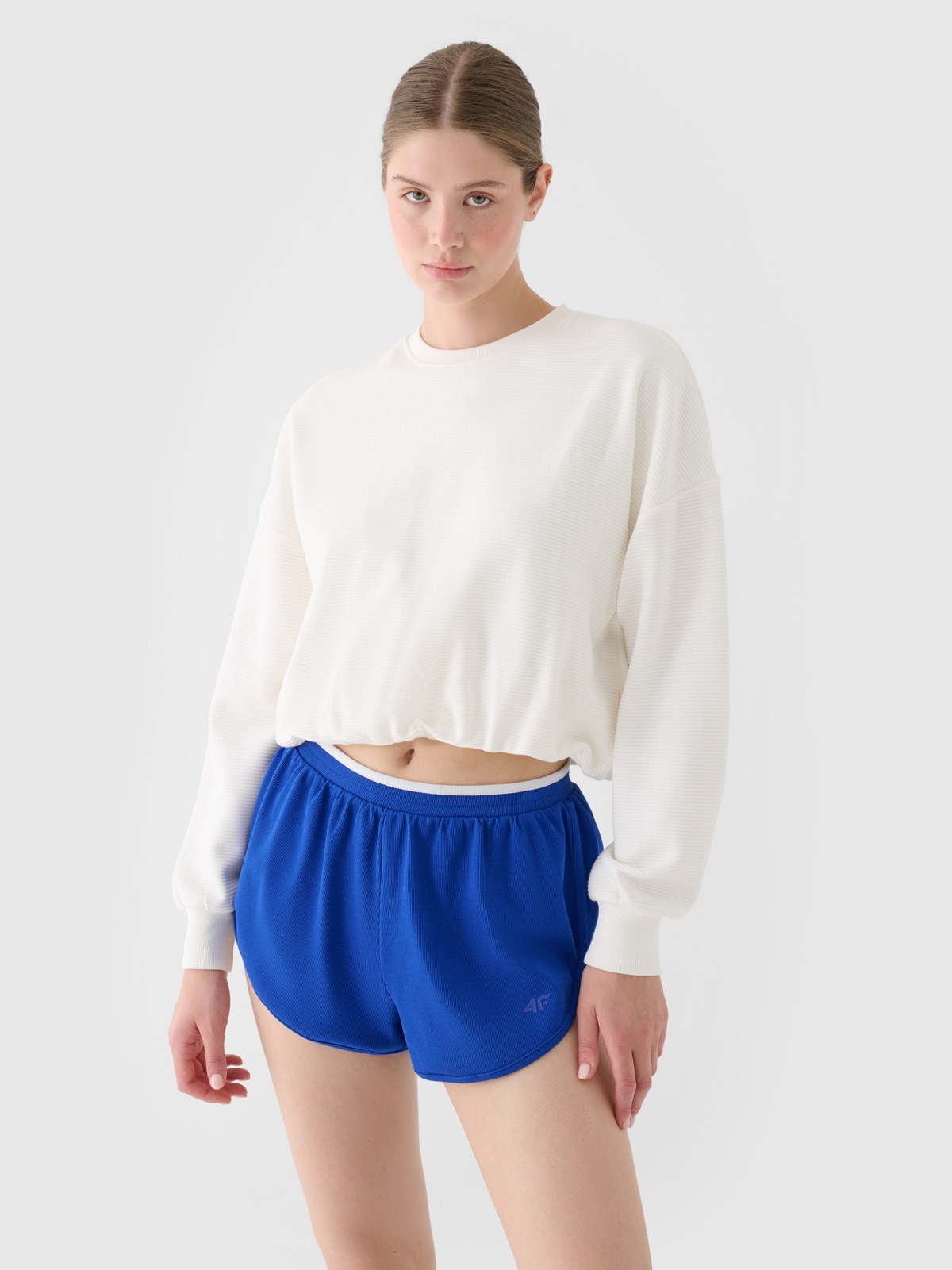 4F Bluza dresowa nierozpinana bez kaptura damska - biała XL