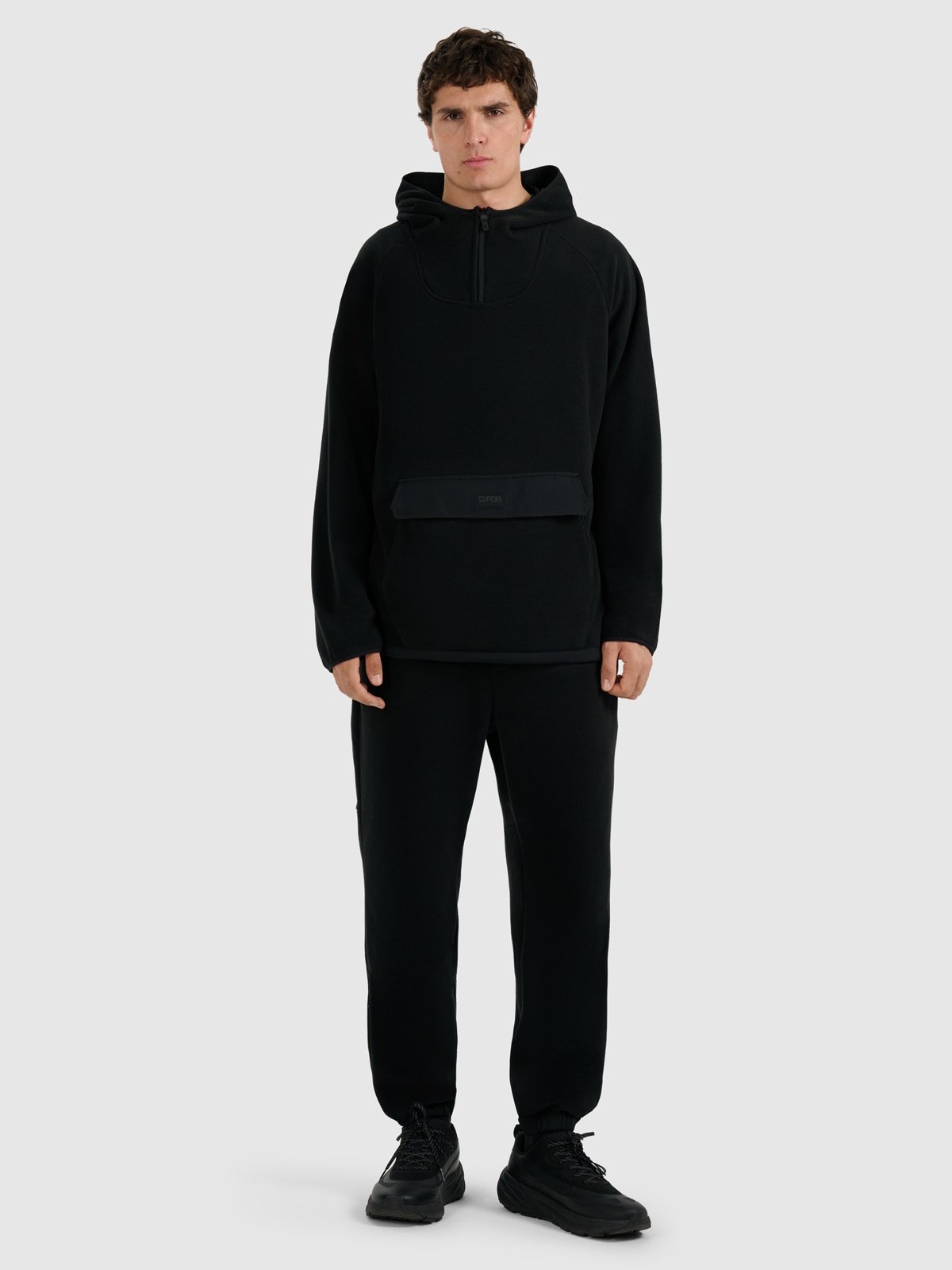 4F Spodnie dresowe polarowe męskie - czarne M