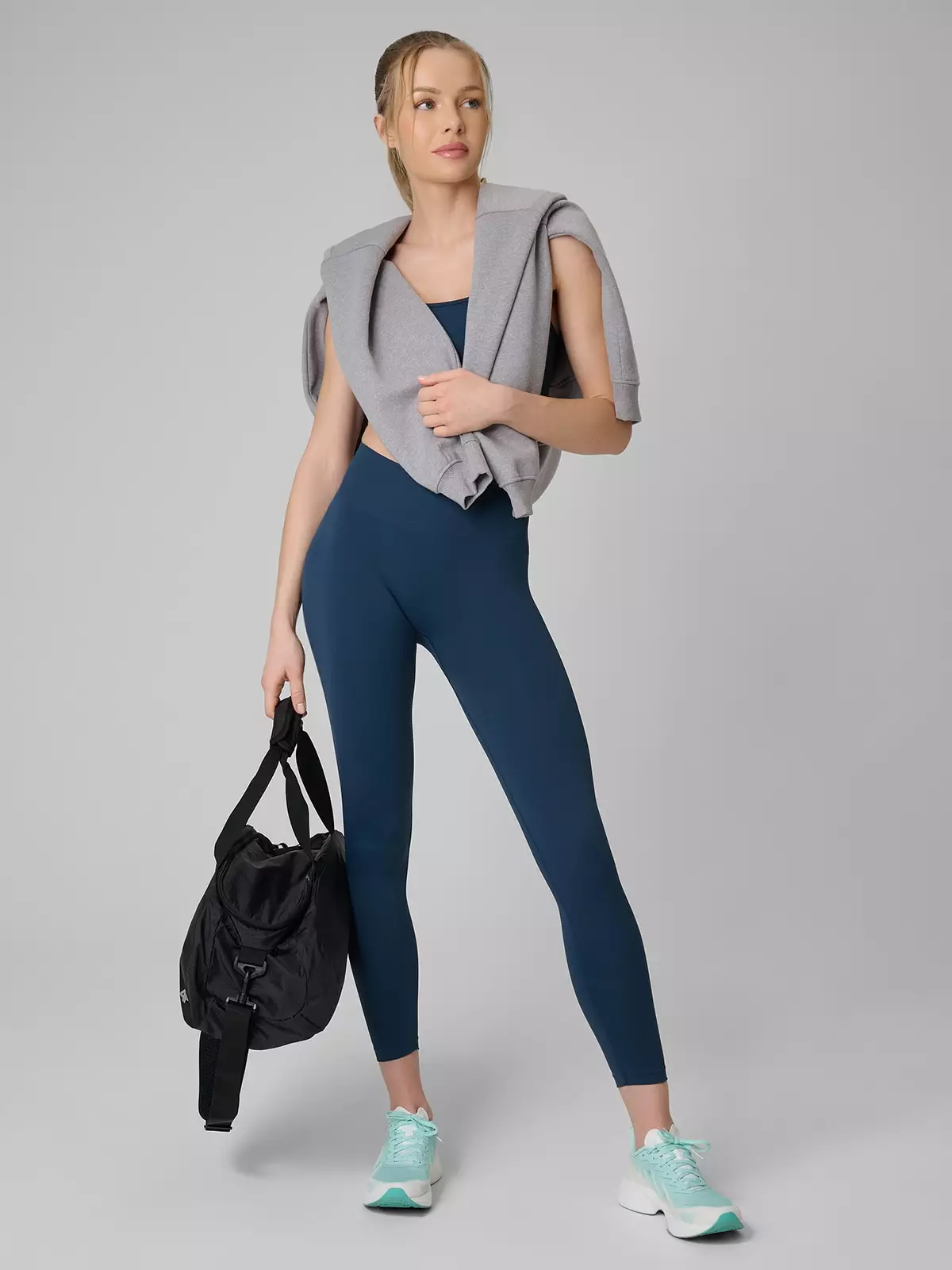 4F Legginsy treningowe bezszwowe damskie - turkusowe M/L