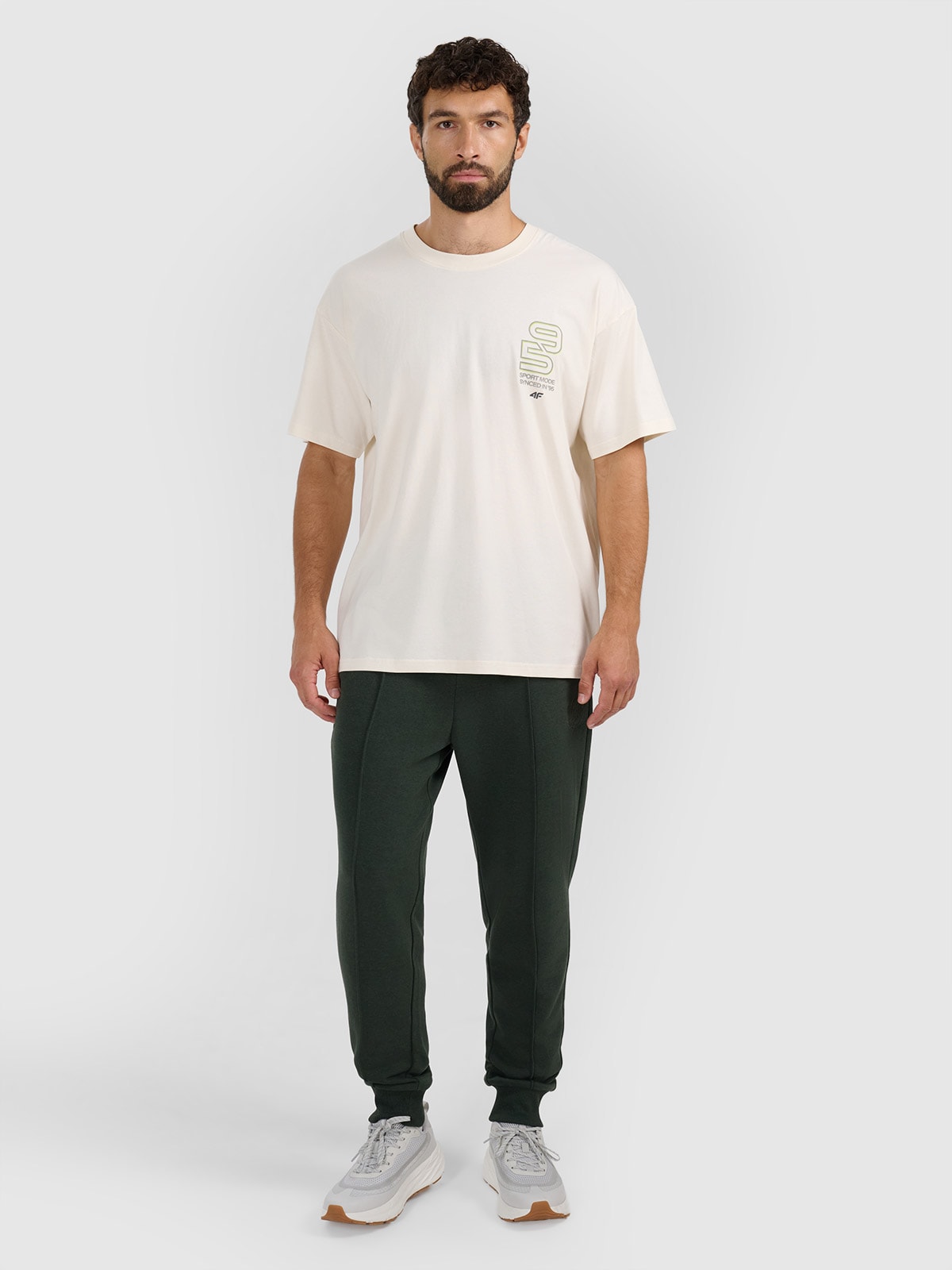 4F Spodnie dresowe joggery męskie - zielone L