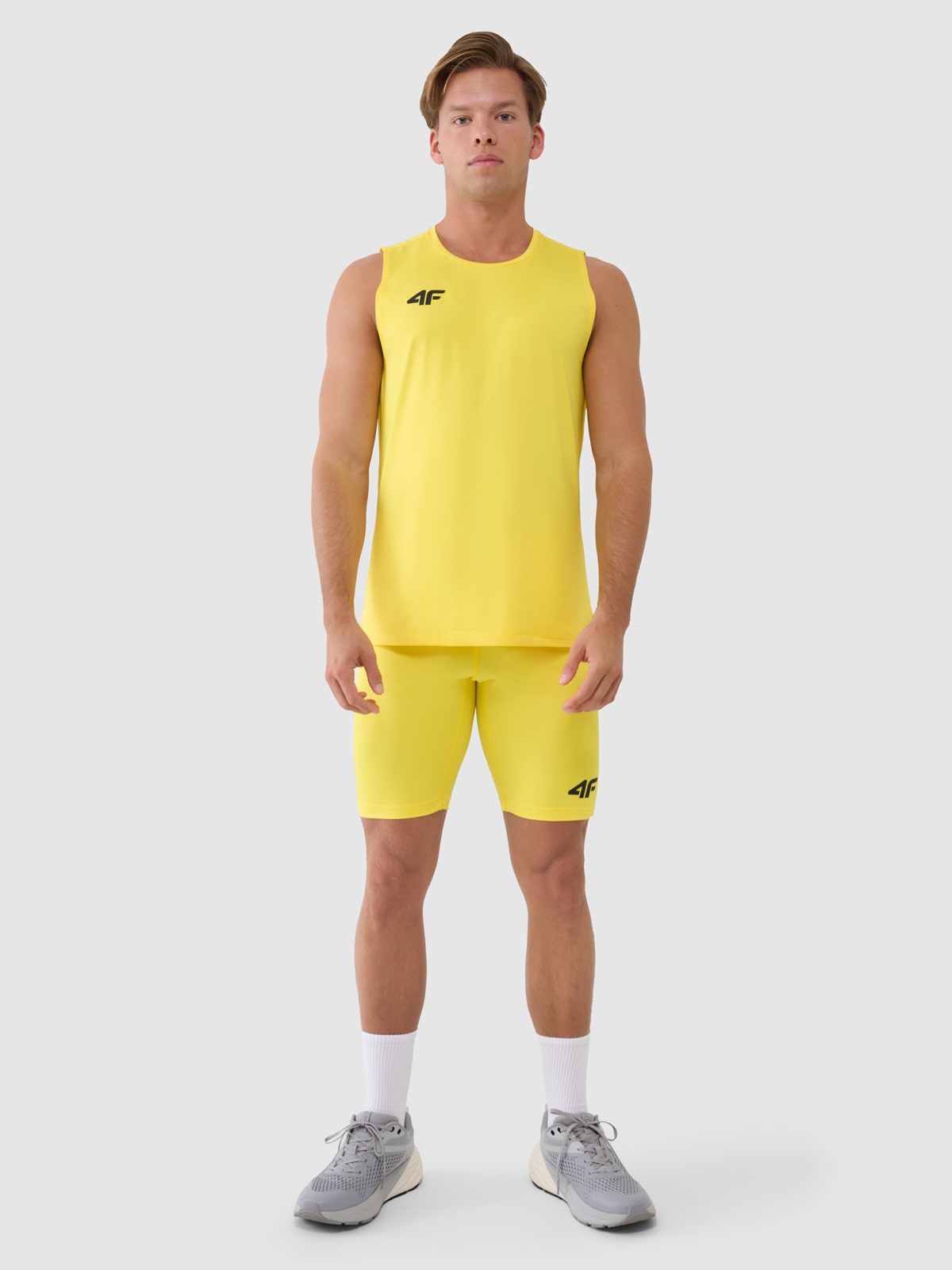 4F Legginsy krótkie treningowe męskie - żółte M