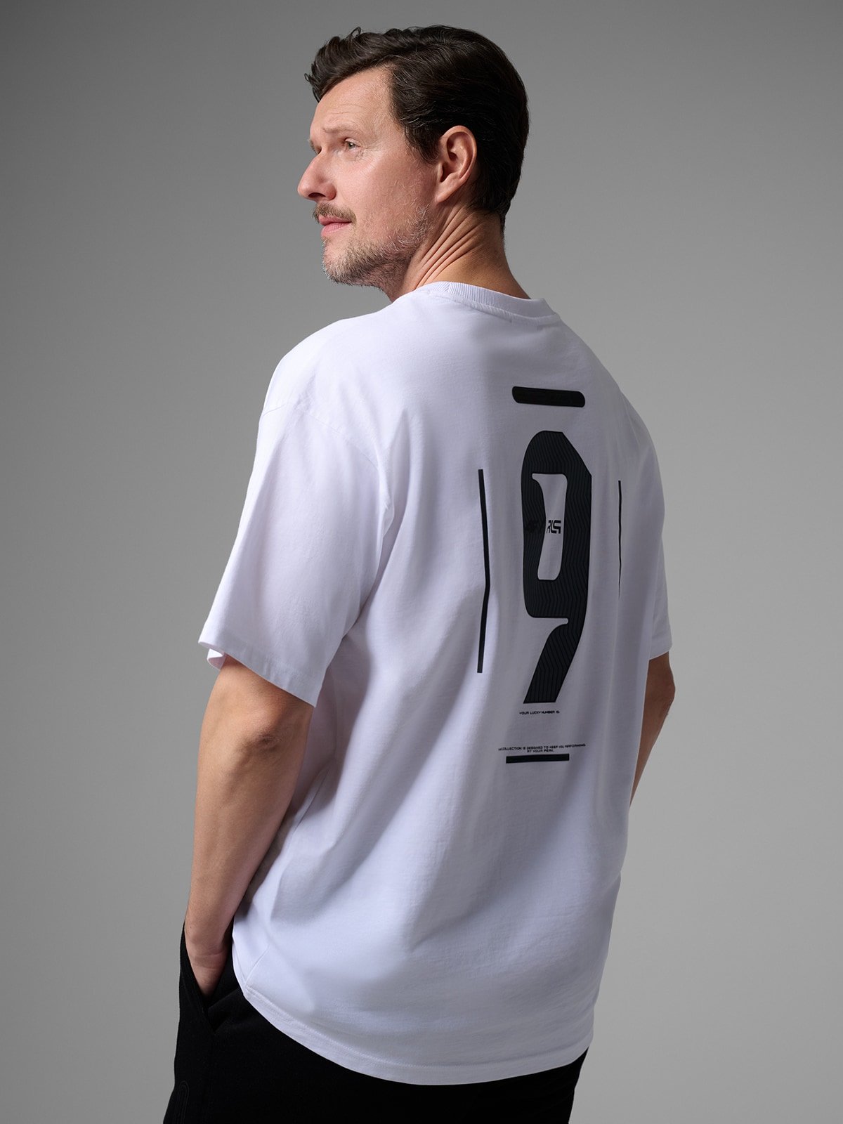 4F T-shirt loose z nadrukiem męski 4F x Robert Lewandowski - biały L