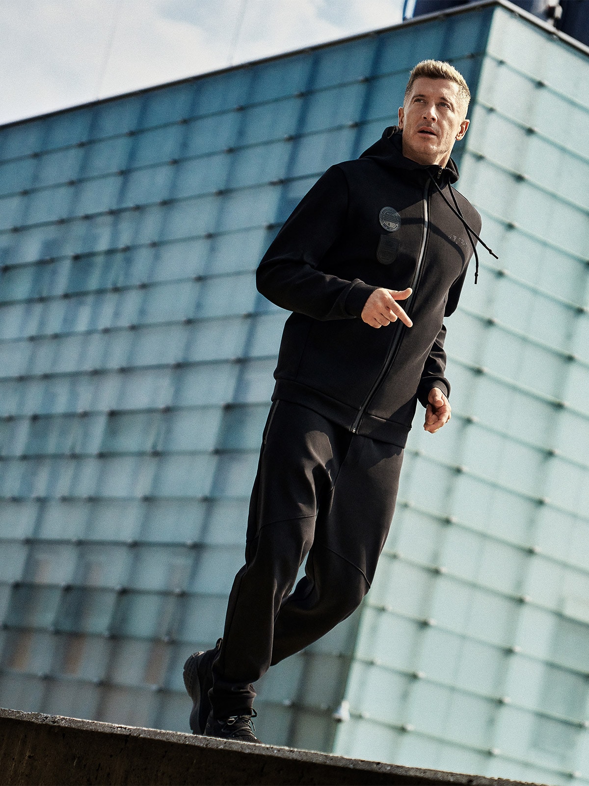 4F Bluza dresowa regular z kapturem męska 4F x Robert Lewandowski - czarna XL