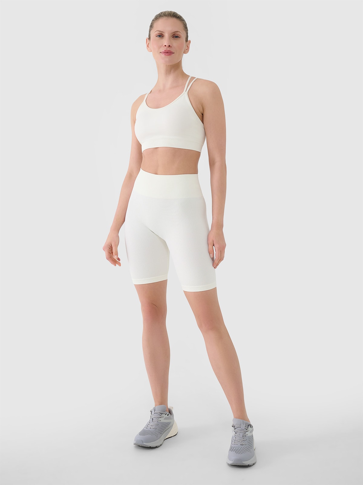 4F Legginsy kolarki bezszwowe treningowe damskie - białe M/L