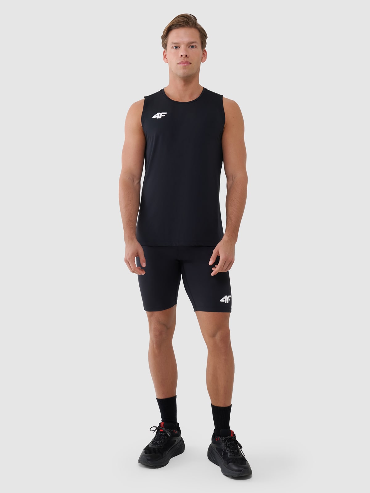 4F Legginsy krótkie treningowe męskie - czarne XXL