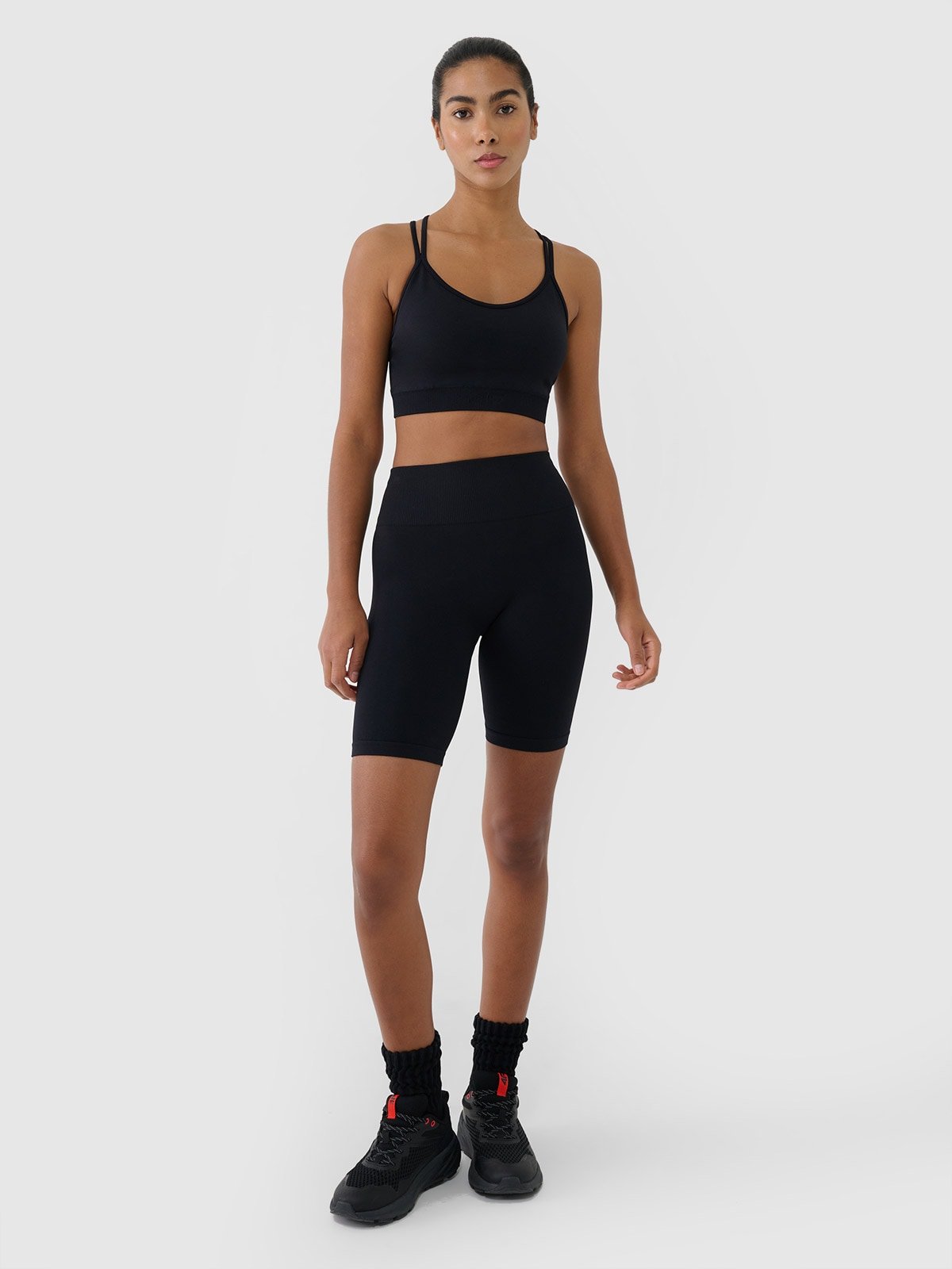 4F Legginsy kolarki bezszwowe treningowe damskie - czarne M/L