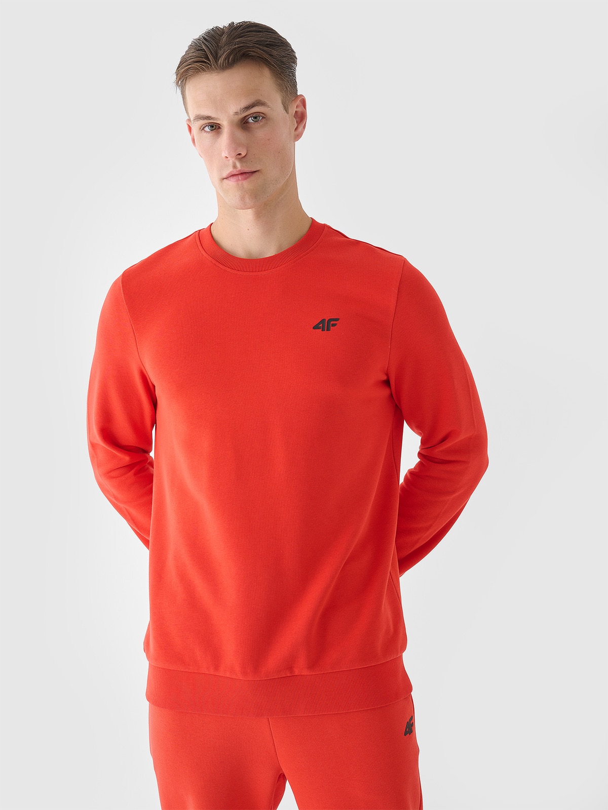 4F Bluza dresowa nierozpinana bez kaptura męska - pomarańczowa S