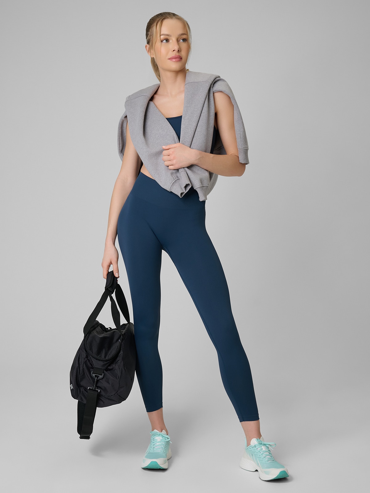 4F Legginsy treningowe bezszwowe damskie - turkusowe XS/S