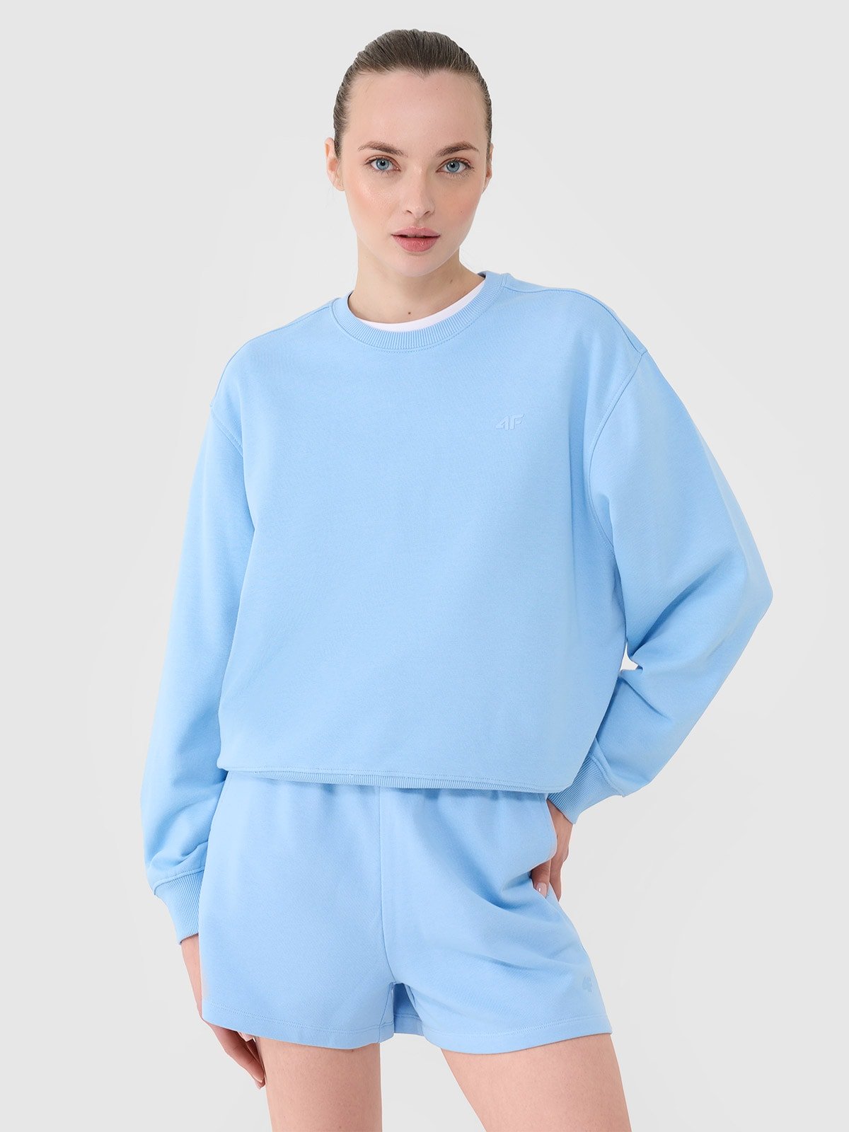 4F Bluza dresowa nierozpinana bez kaptura damska - niebieska S