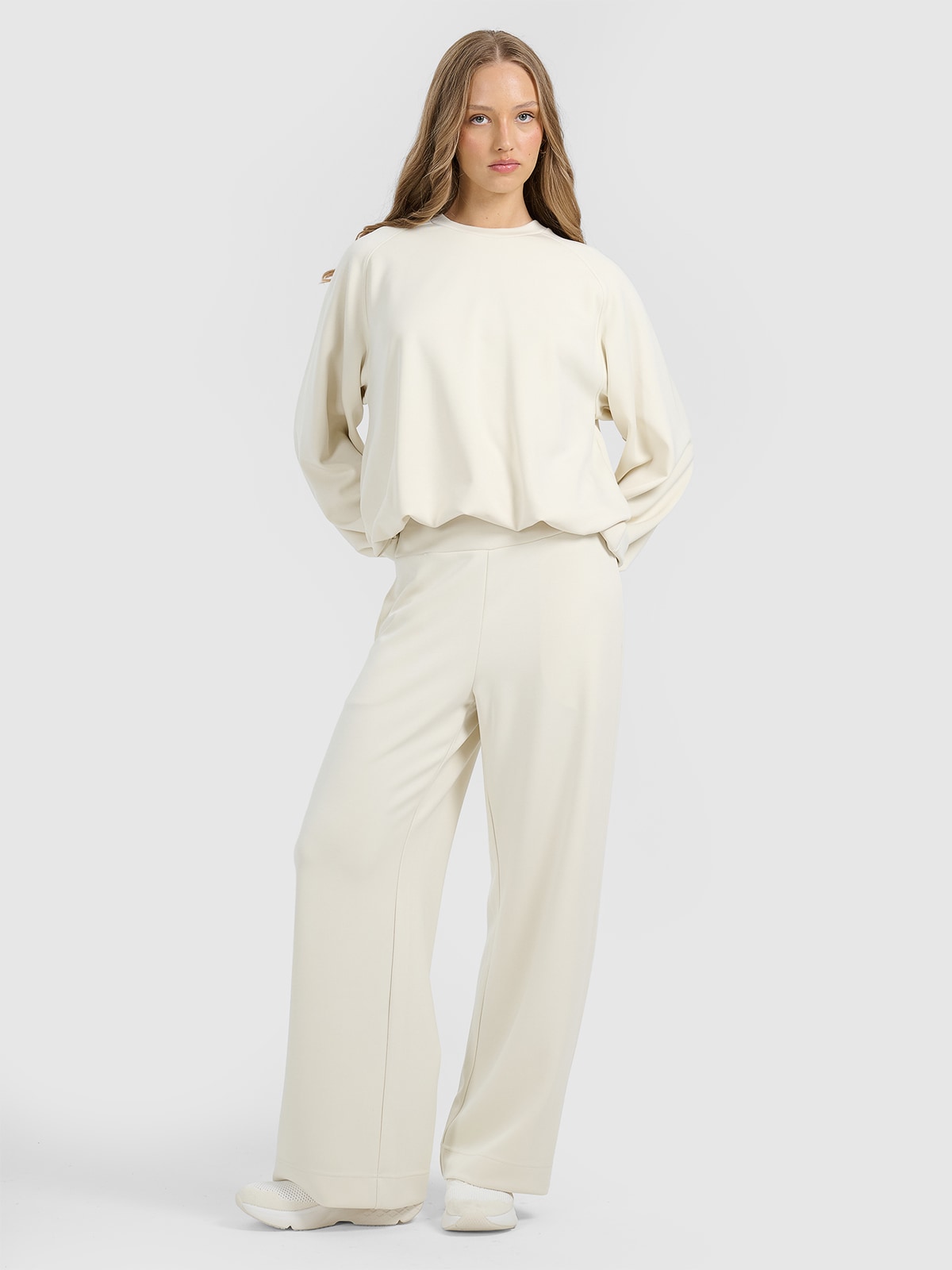 4F Spodnie dresowe z szerokimi nogawkami z modalem damskie - beżowe XL