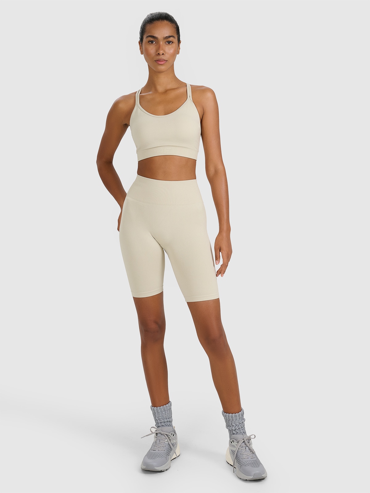 4F Legginsy kolarki treningowe bezszwowe damskie - beżowe M/L