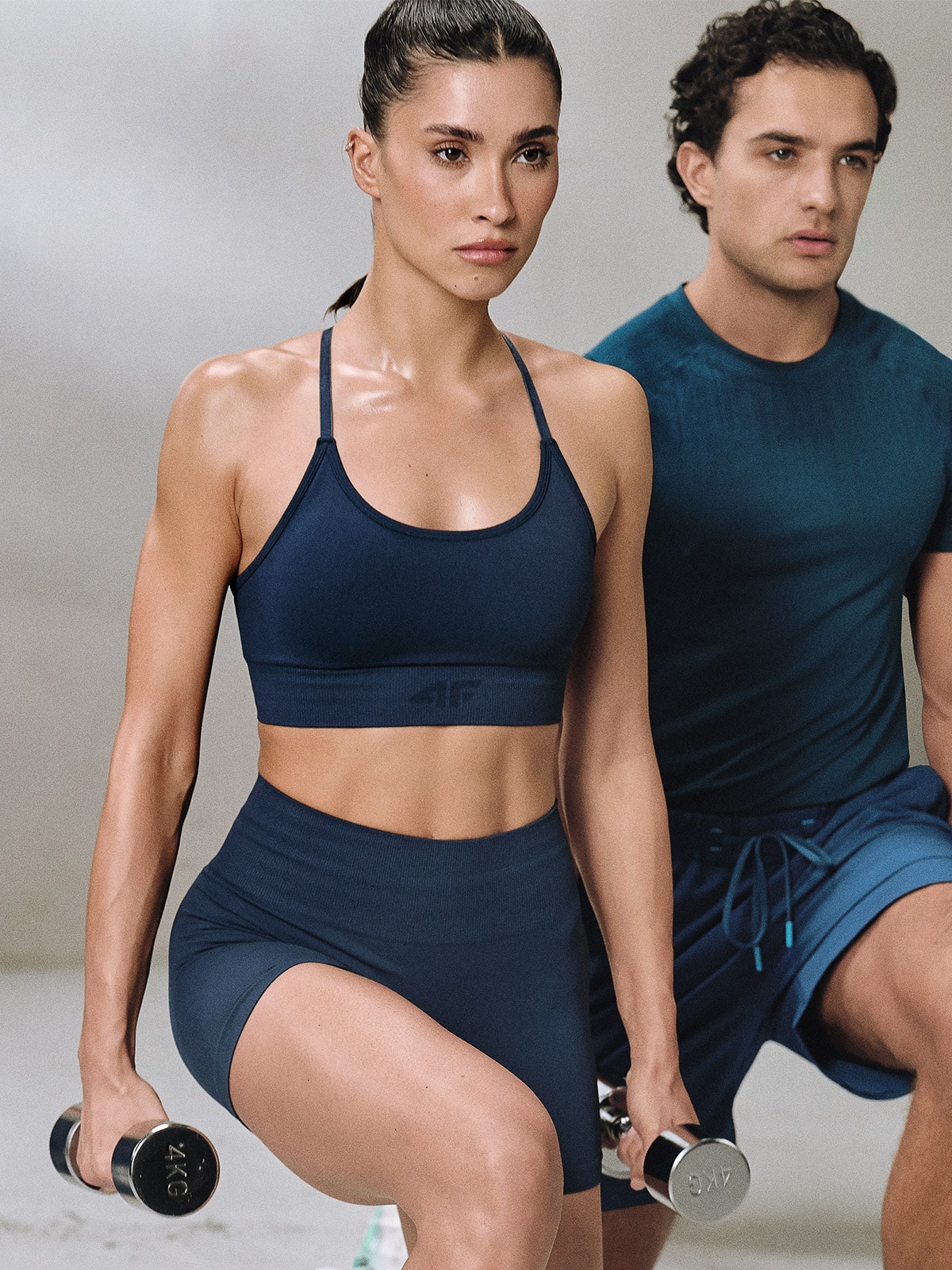 4F Biustonosz treningowy bezszwowy z niskim wsparciem damski - turkusowy M/L