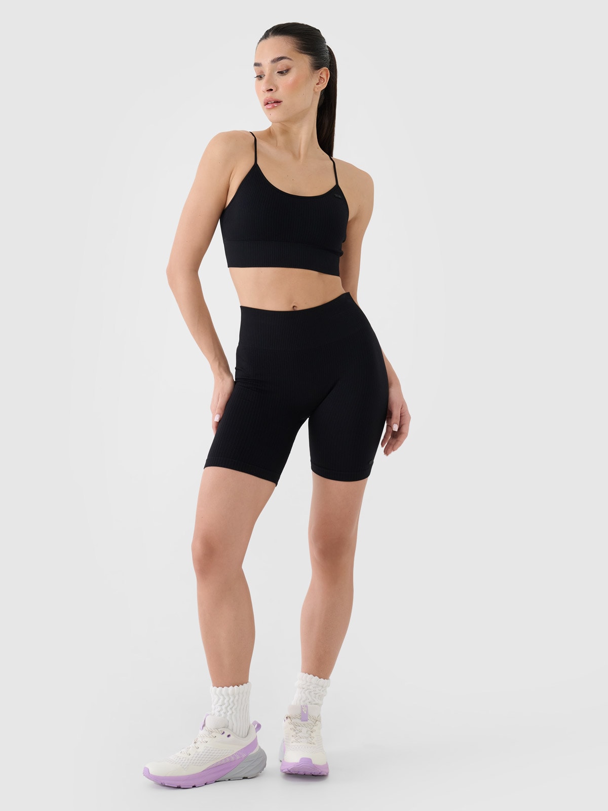 4F Legginsy kolarki bezszwowe treningowe damskie - czarne M/L