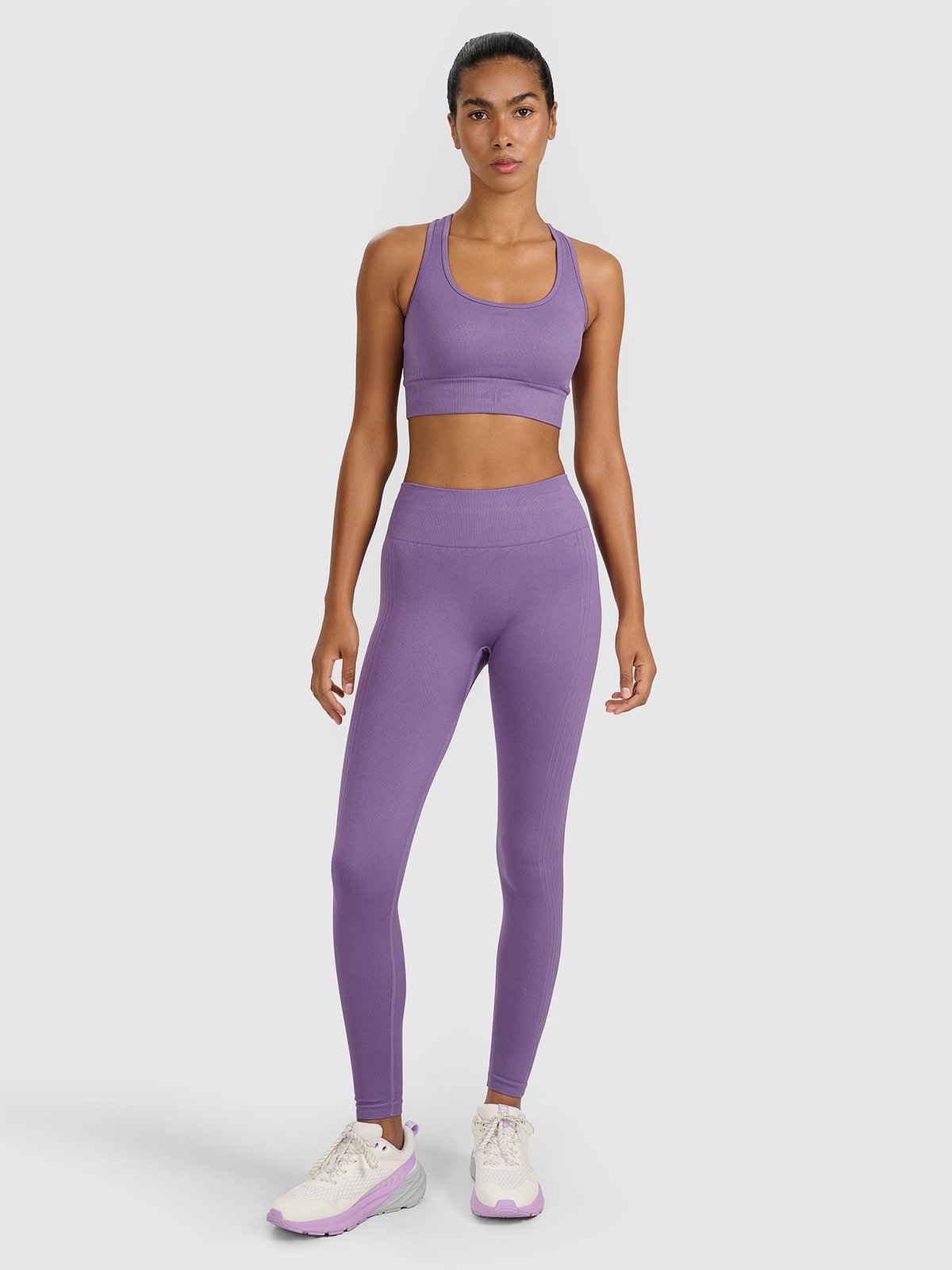 4F Legginsy treningowe bezszwowe damskie - fioletowe M/L
