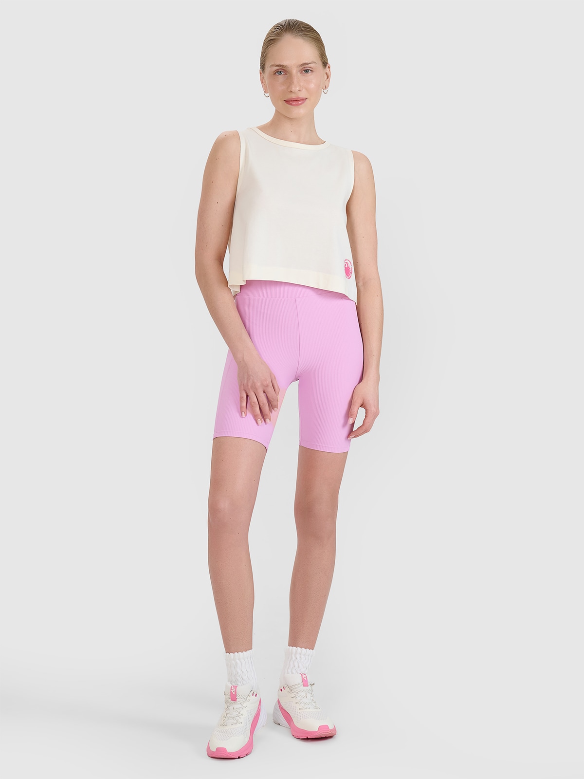 4F Legginsy krótkie dzianinowe damskie - różowe S