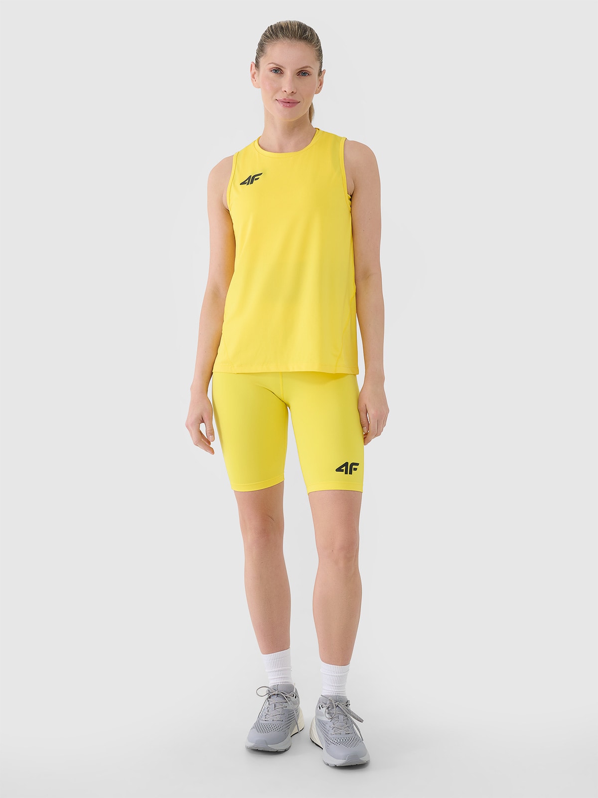 4F Legginsy kolarki treningowe damskie - żółte XS