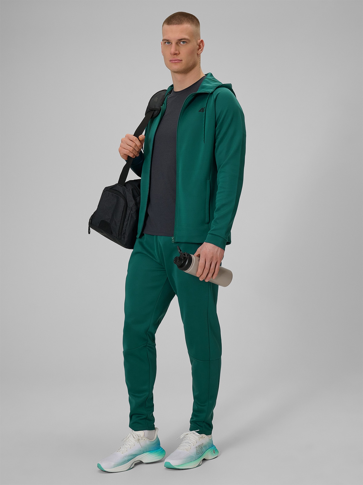 4F Spodnie treningowe szybkoschnące męskie - zielone S