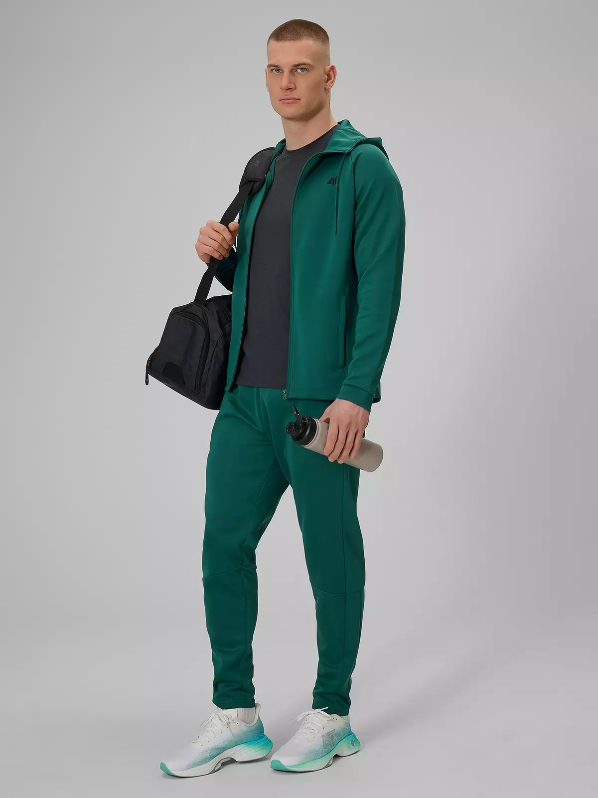 4F Spodnie treningowe szybkoschnące męskie - zielone S