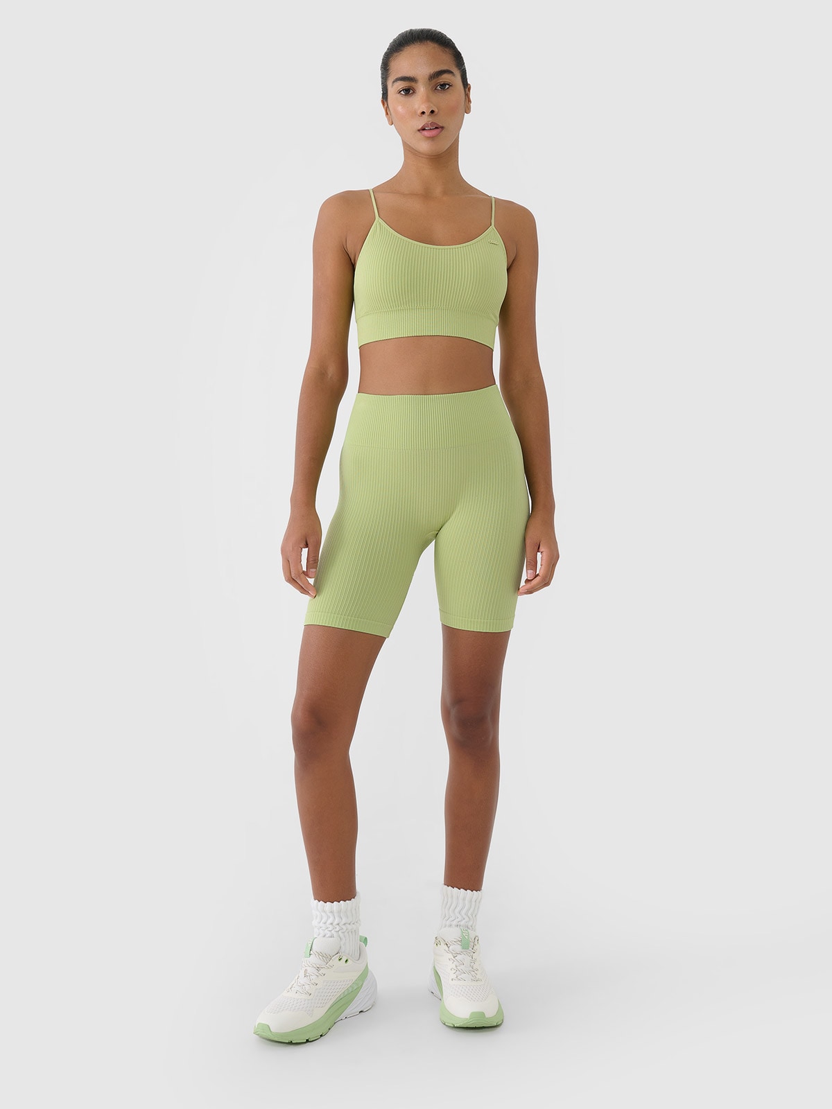 4F Legginsy kolarki bezszwowe treningowe damskie - zielone M/L