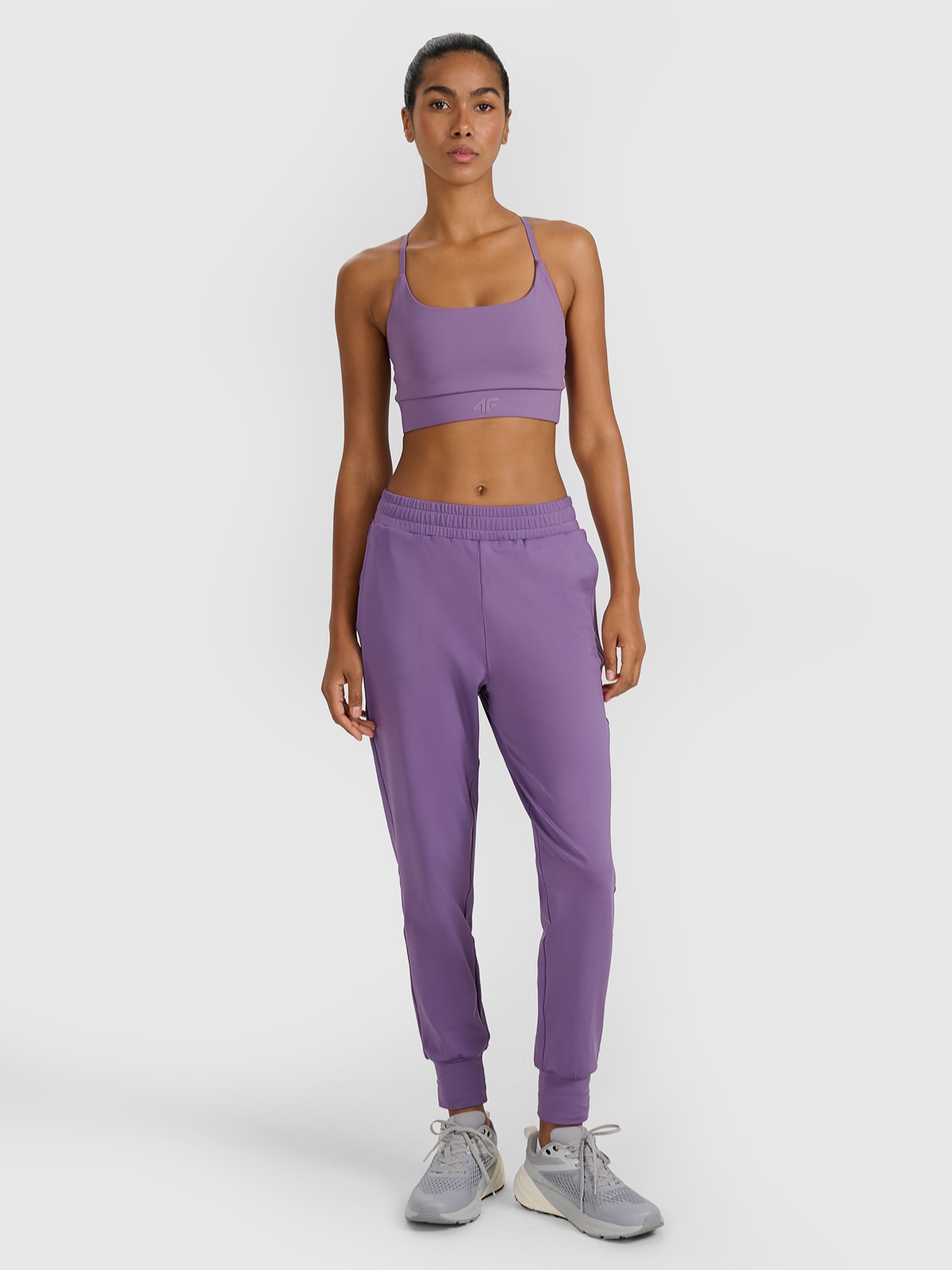 4F Spodnie treningowe szybkoschnące damskie - fioletowe M